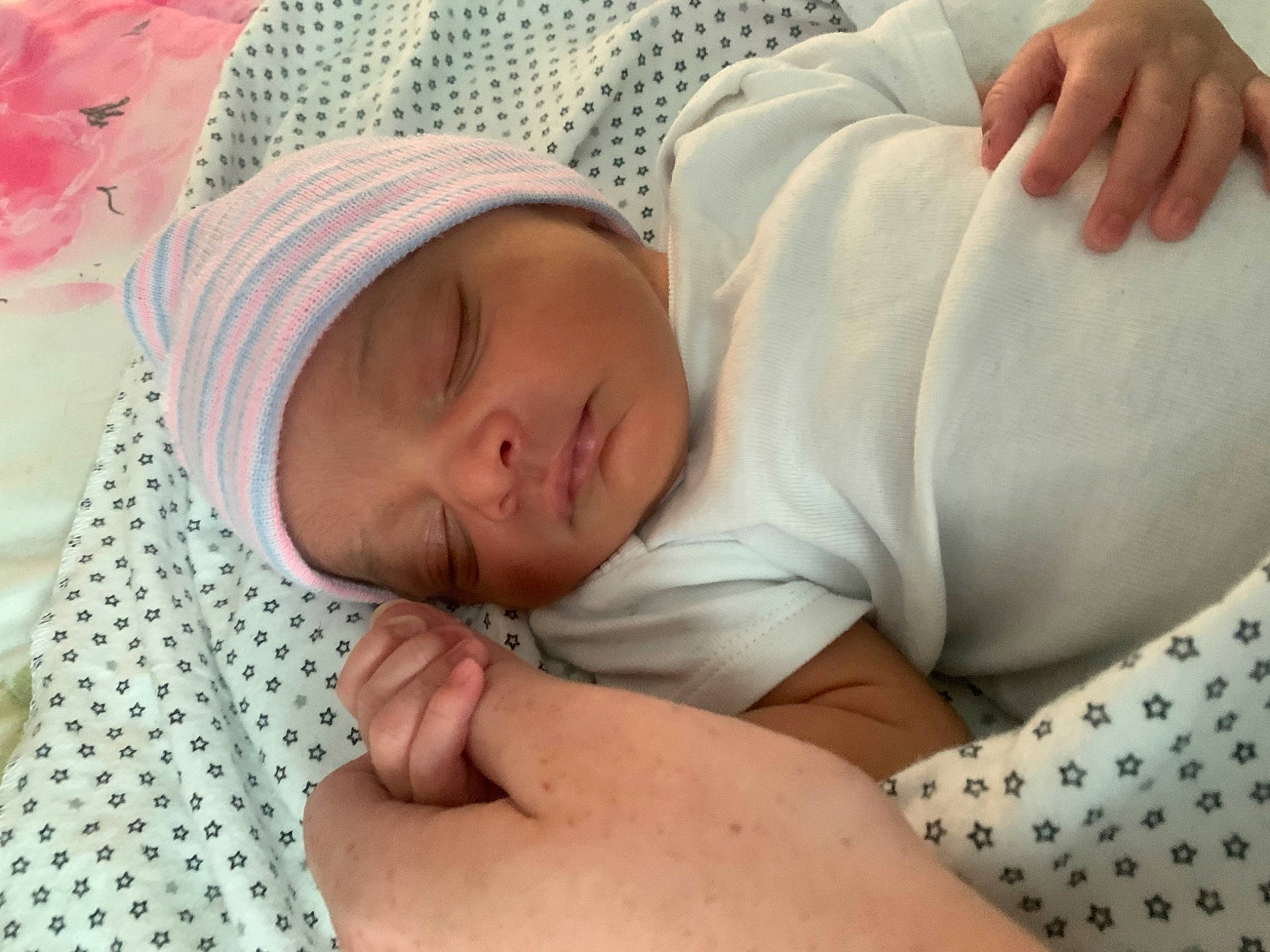 Jiraya joined the competition — help win amazing prizes! arm, baby, baby_products, baby_sleeping, cheek, child, comfort, eye, finger, gesture, hand, head, headwear, human_body, linens, mammal, mouth, person, skin, textile