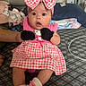 Carrusela is registered to the contest to win money with this photo: baby, child, pink_bow, headband, hello_kitty, dress, mittens, socks, surprised_expression, indoor, person, infant, seated, patterned_surface, baby_wipes, hand, cute, clothing, accessory, portrait