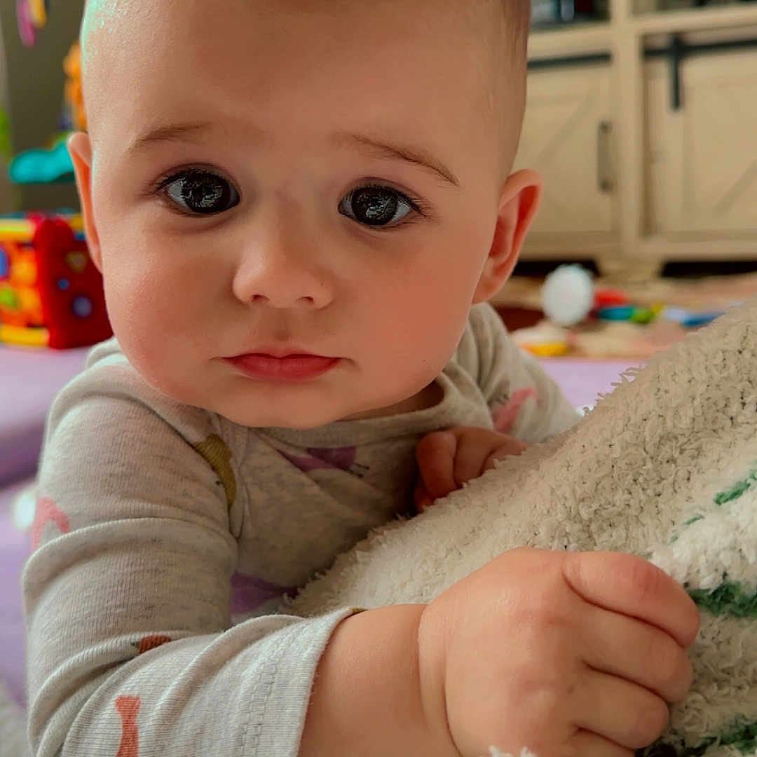 Sunni joined the competition — help win amazing prizes! baby, bodypart, computerhardware, couch, electronics, face, finger, furniture, hand, happy, hardware, head, monitor, newborn, person, photography, portrait, screen, smile, tv