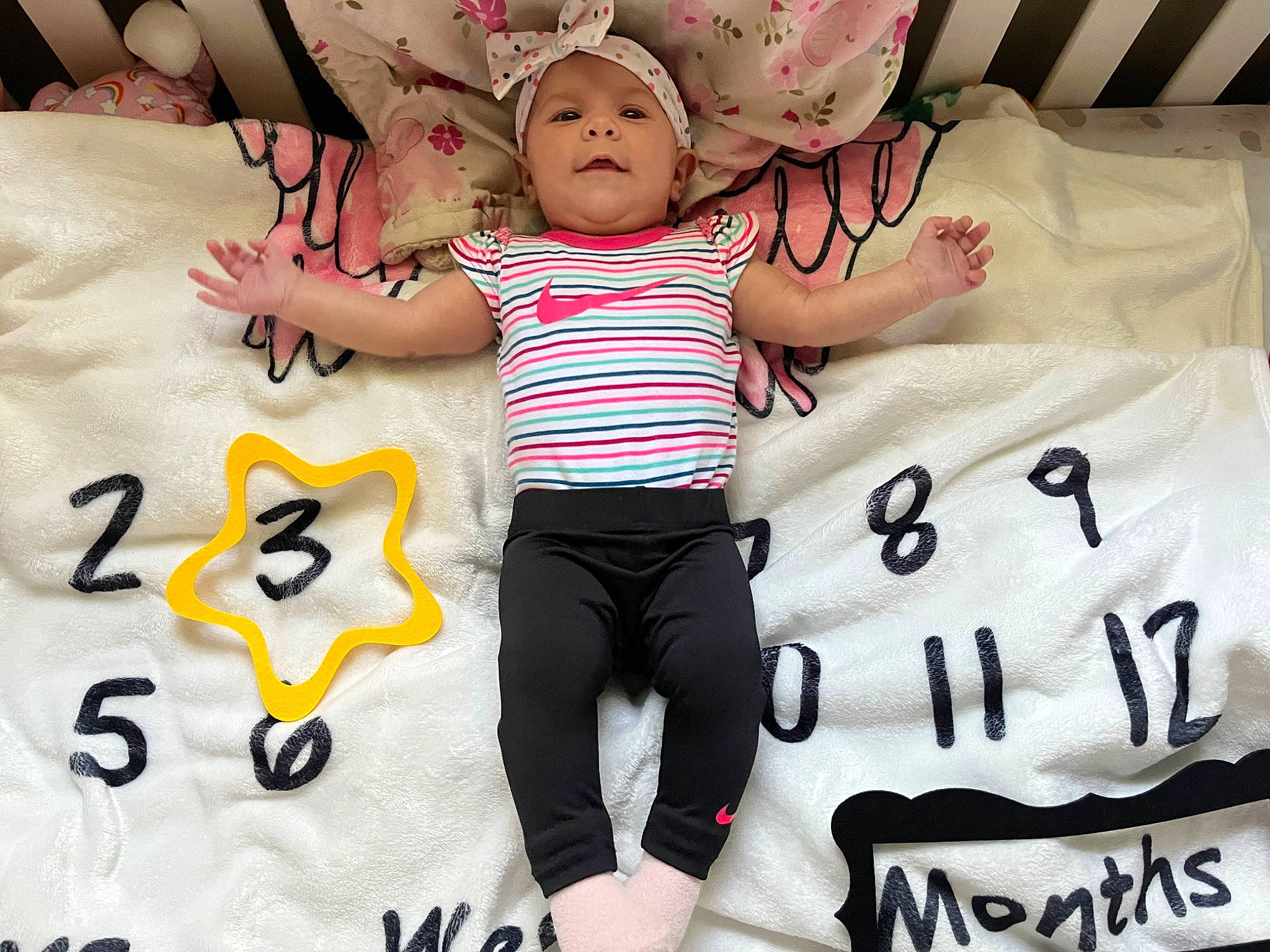 Journee joined the competition — help win amazing prizes! baby, baby_sleeping, baby_toddler_clothing, bedding, comfort, cool, face, font, happy, headwear, linens, pattern, person, photograph, pink, product, sleeve, t_shirt, textile, throw_pillow