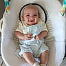 baby, smiling, infant, baby_rocker, child, happy, sitting, clothing, socks, face, indoor, seat, cute, comfort, playful, soft, colorful, small_child, portrait, young