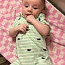 Noah joined the competition — help win amazing prizes! baby, infant, towel, onesie, striped_clothing, whale_pattern, hand, face, curious, lying_down, indoors, child, cute, skin, head, eyes, mouth, person, newborn, soft_texture