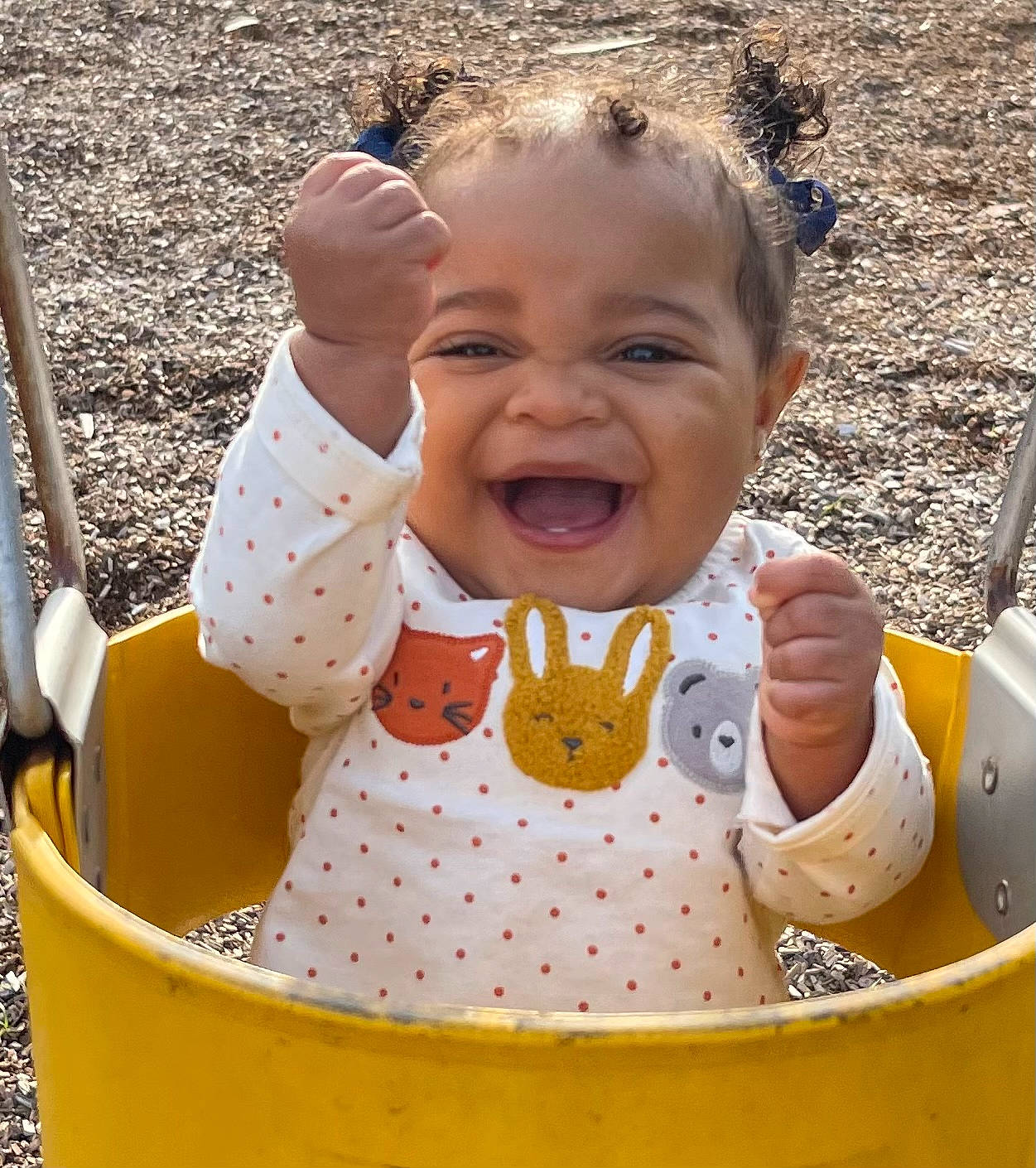 Rio joined the competition — help win amazing prizes! baby, baby_toddler_clothing, bib, cheek, child, facial_expression, fun, grass, happy, leisure, mouth, nose, pattern, people_in_nature, person, play, recreation, sitting, skin, smile