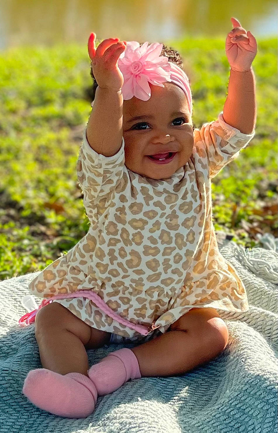 Rio joined the competition — help win amazing prizes! baby, baby_toddler_clothing, child, clothing, eye, face, flash_photography, fun, gesture, grass, happy, headwear, joy, leisure, people_in_nature, person, photograph, pink, plant, smile