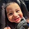 Aaron joined the competition — help win amazing prizes! baby, child, infant, smiling, happy, face, portrait, car_seat, vehicle, safety_harness, seatbelt, sunlight, indoors, close_up, brown_hair, eyes, teeth, cheeks, sitting, photography