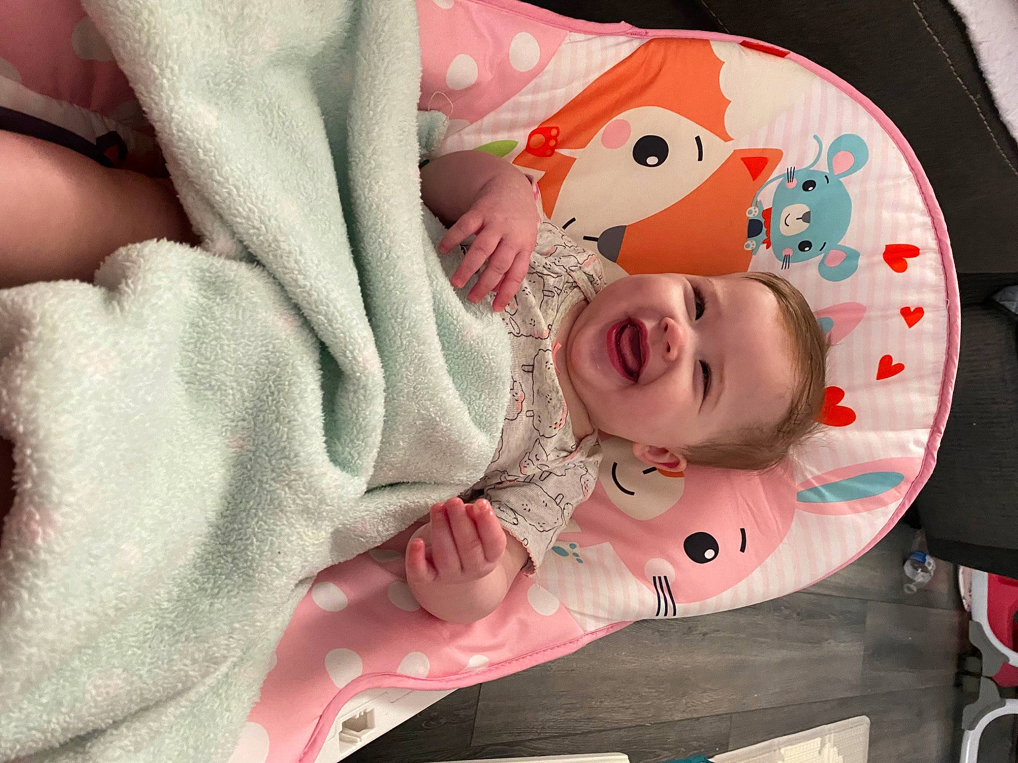 Gracie is registered to the contest to win money with this photo: art, baby, baby_products, baby_safety, baby_sleeping, baby_toddler_clothing, cheek, child, comfort, hat, headgear, linens, pattern, person, pink, room, skin, sleeve, smile, textile