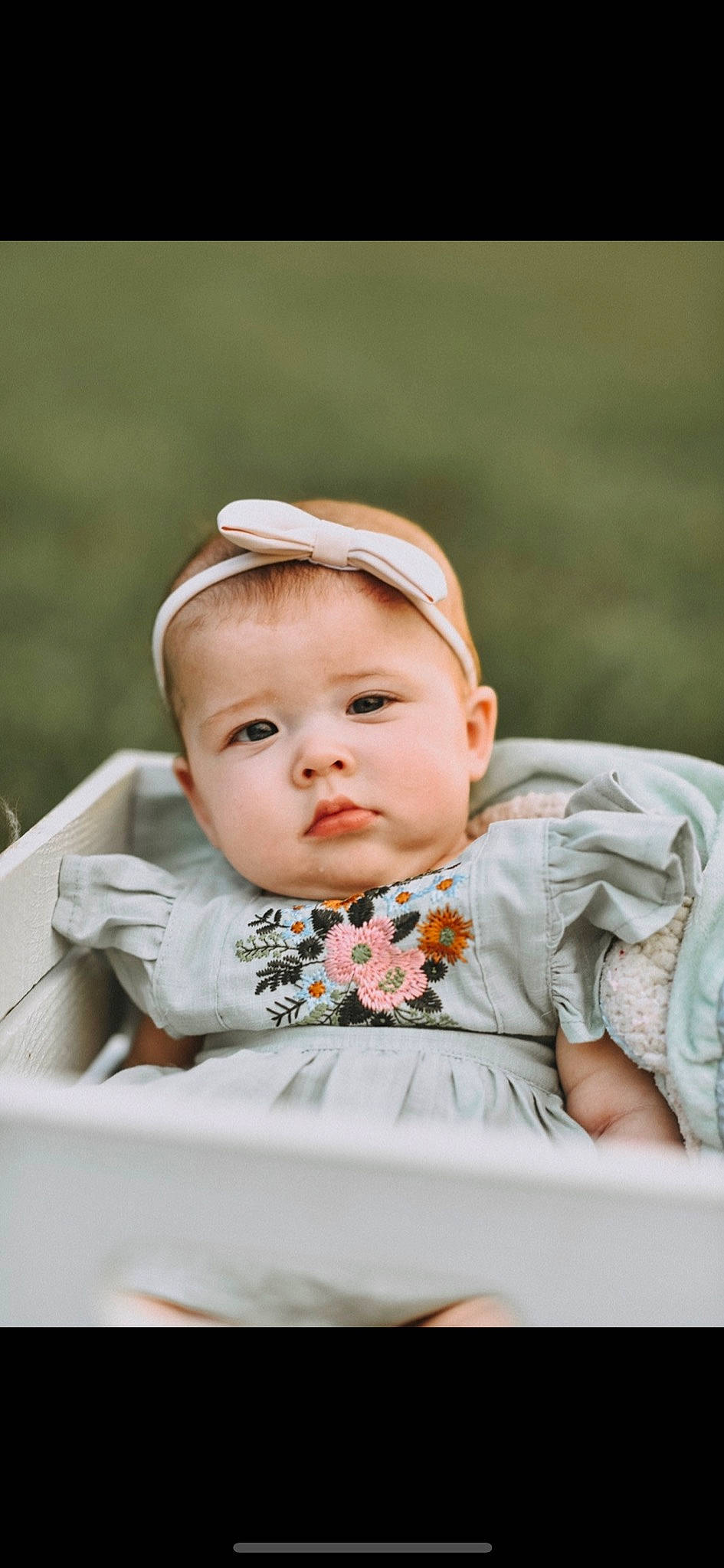 Gracie joined the competition — help win amazing prizes! baby, baby_toddler_clothing, cheek, child, chin, comfort, dress, flash_photography, grass, happy, iris, lip, mammal, person, portrait_photography, sitting, skin, sleeve, toddler, vacation