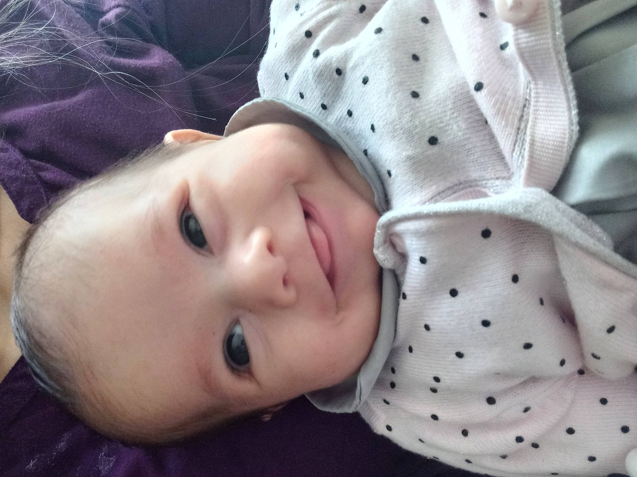 Celeste participe au concours pour gagner de l'argent avec cette photo : baby, baby_toddler_clothing, cheek, child, comfort, eyelash, face, grass, happy, lip, pattern, person, portrait_photography, skin, sleeve, toddler, white