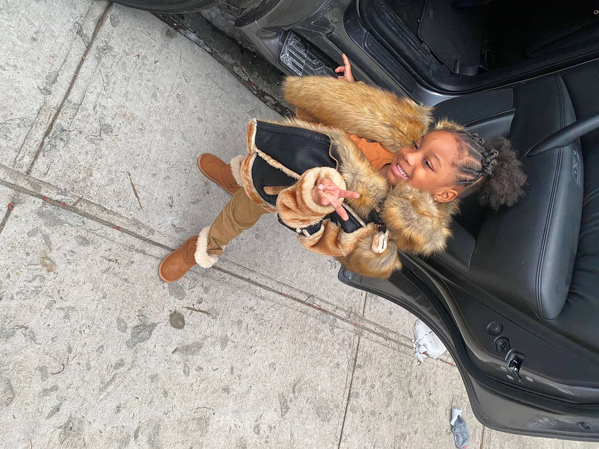 Kehlani is registered to the contest to win money with this photo: asphalt, auto_part, automotive_exterior, automotive_window_part, bumper, car, car_seat, eyewear, family_car, flooring, fun, human_leg, joy, leg, luxury_vehicle, motor_vehicle, person, road_surface, thigh, trunk