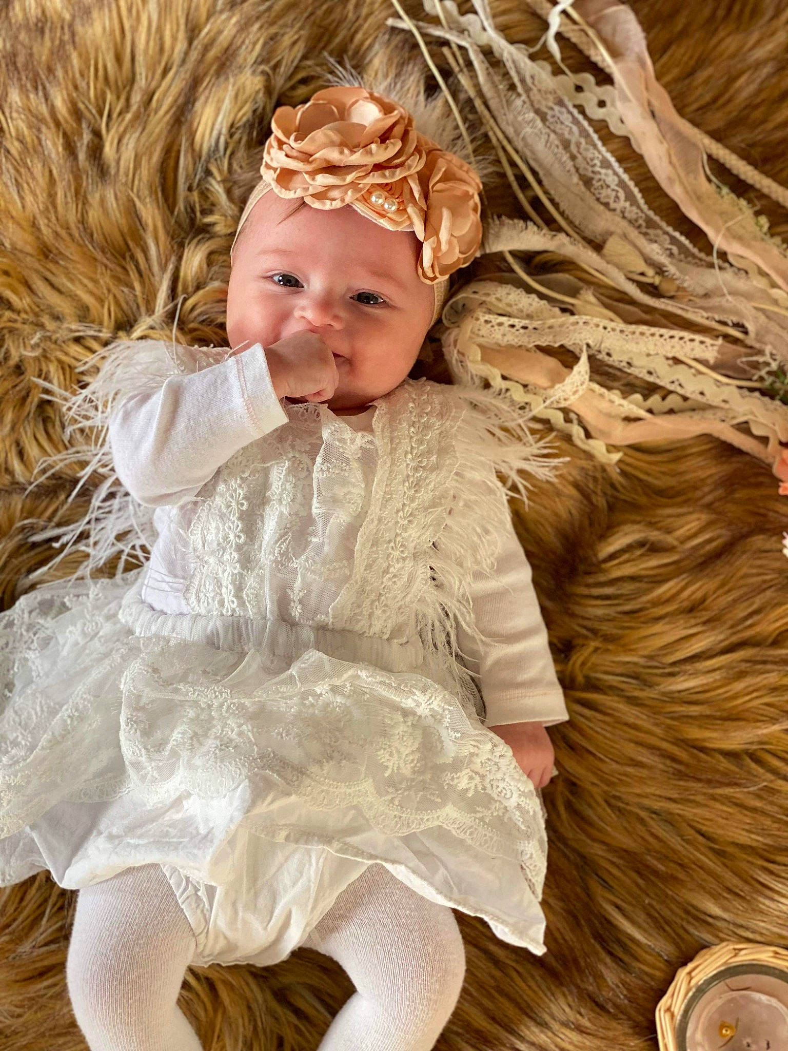 Clarysse participe au concours pour gagner de l'argent avec cette photo : baby, baby_toddler_clothing, blond, bridal_accessory, child, dress, embellishment, eye, fashion_design, fawn, fur, hair_accessory, happy, headband, headgear, headpiece, headwear, iris, outerwear, person