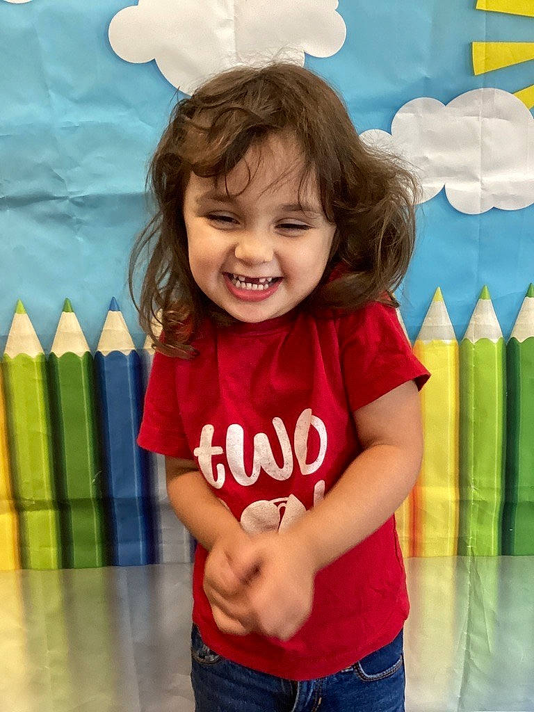Izzy joined the competition — help win amazing prizes! baby, baby_toddler_clothing, blue, child, electric_blue, facial_expression, fun, gesture, green, happy, joy, leisure, magenta, pattern, person, pink, product, sleeve, smile, standing