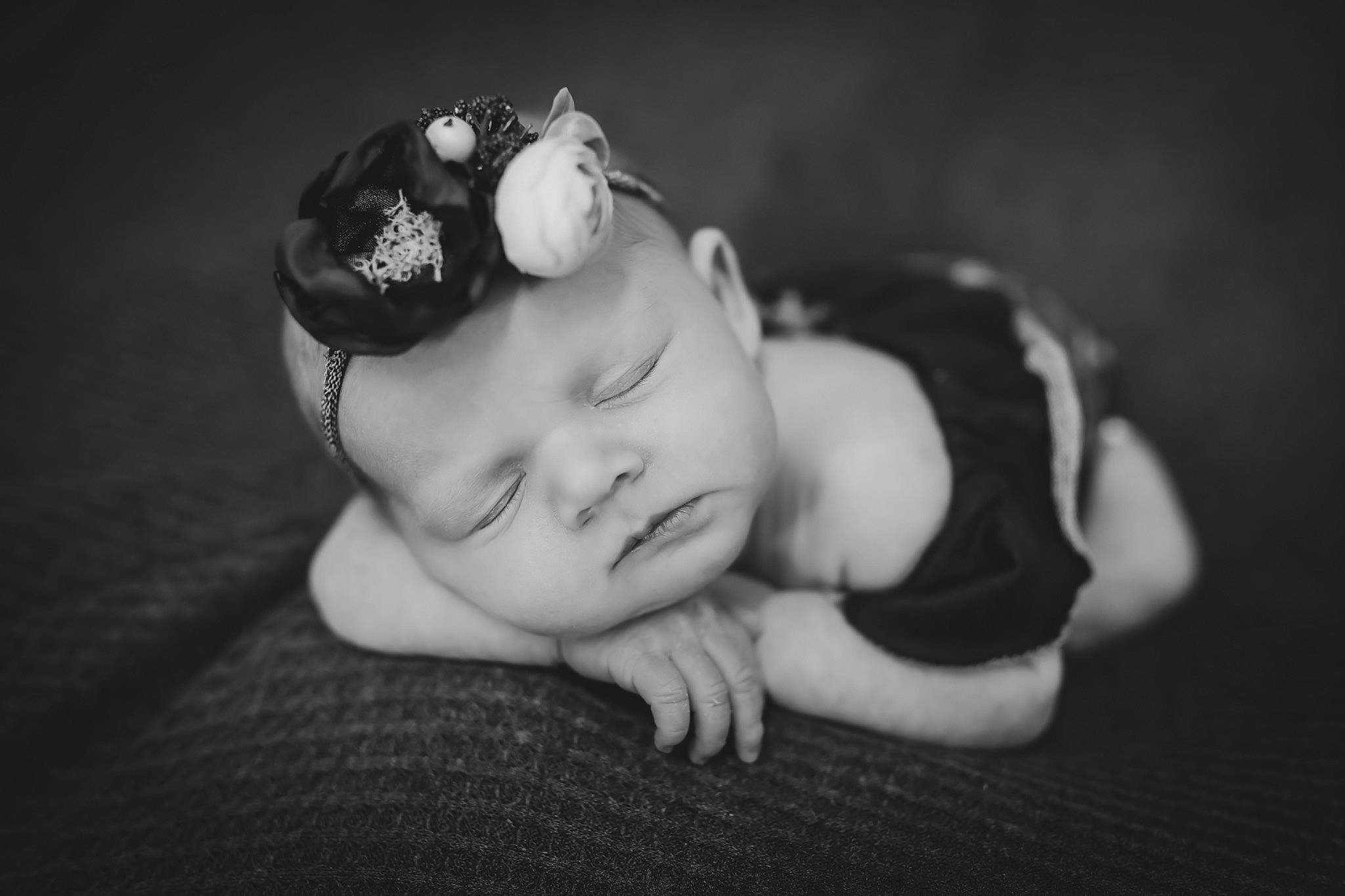 Kendal is registered to the contest to win money with this photo: baby, black, black_and_white, cheek, child, eye, fashion_accessory, flash_photography, hair_accessory, hand, headgear, headpiece, monochrome, monochrome_photography, person, photograph, photography, skin, still_life_photography, toddler