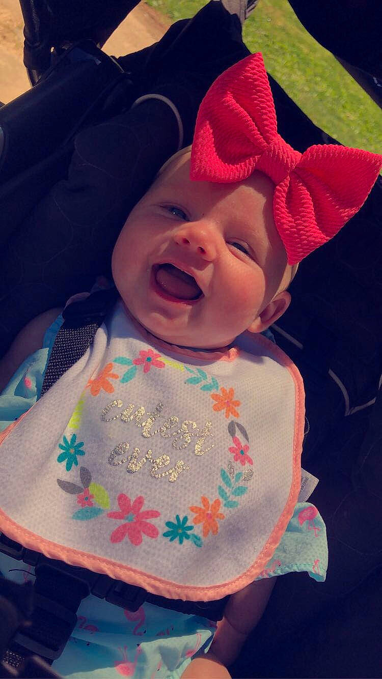 Kendal joined the competition — help win amazing prizes! baby, cheek, child, cool, ear, face, facial_expression, forehead, happy, hat, head, headgear, headwear, lip, mouth, nose, person, pink, plant, skin