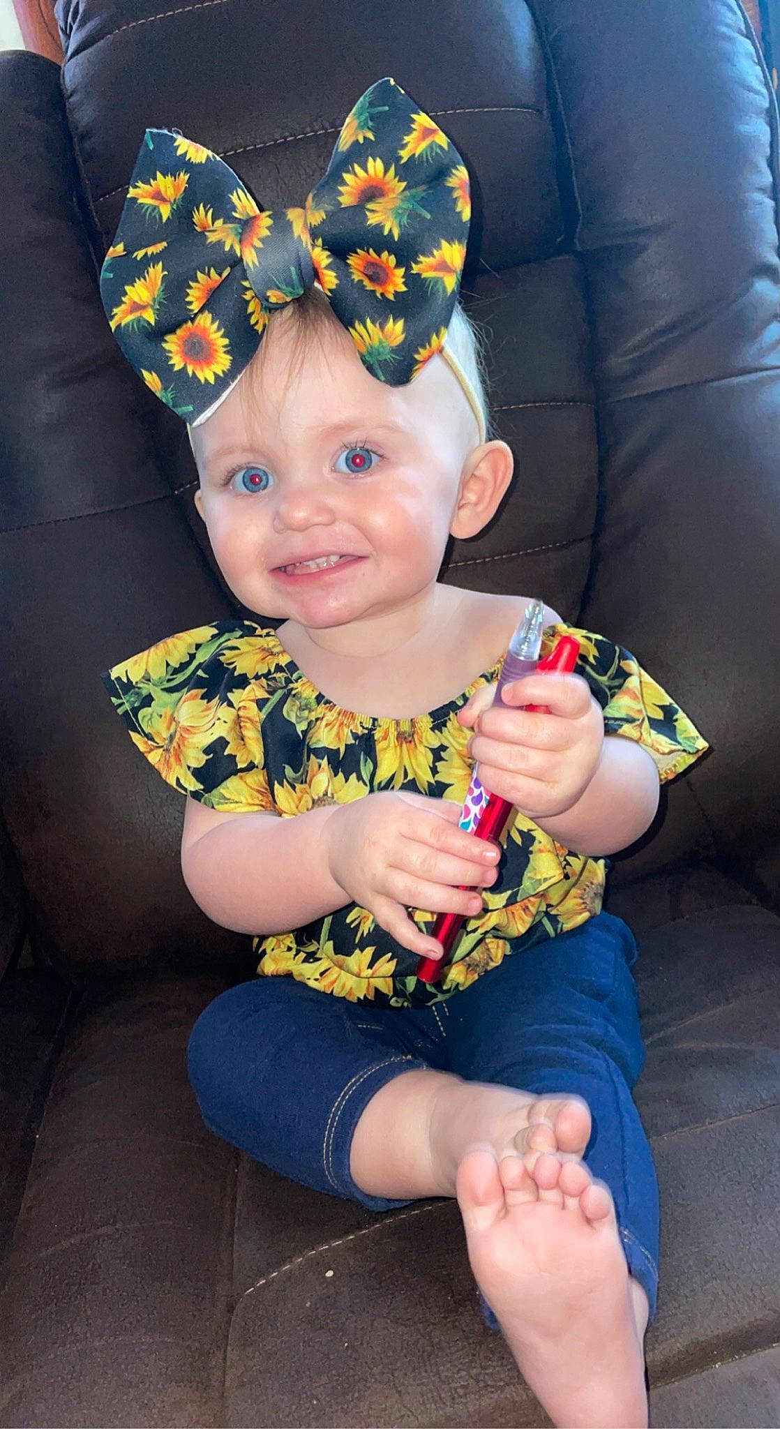 Addison joined the competition — help win amazing prizes! baby, baby_toddler_clothing, cap, child, costume_hat, fashion_accessory, finger, fun, grass, happy, hat, headband, headpiece, headwear, jewellery, joy, party_hat, pattern, person, sitting