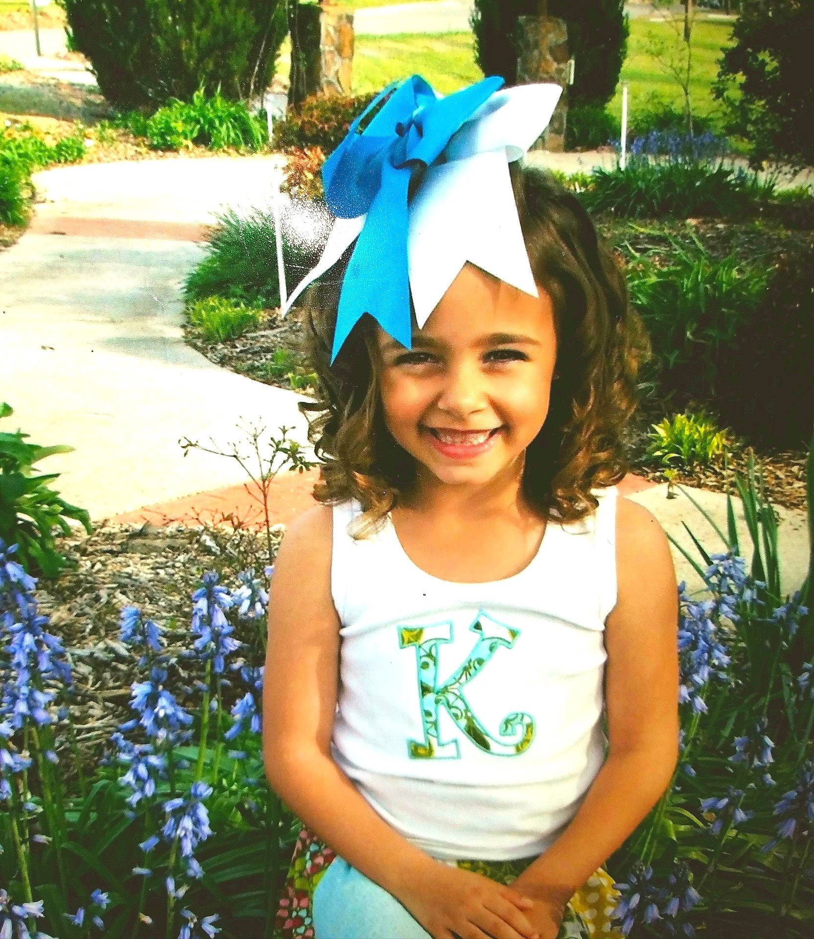 Makaylee joined the competition — help win amazing prizes! cap, child, day, facial_expression, fashion_accessory, fun, girl, grass, hair_accessory, happiness, hat, headgear, headpiece, joy, party_hat, person, plant, smile, summer, sun_hat