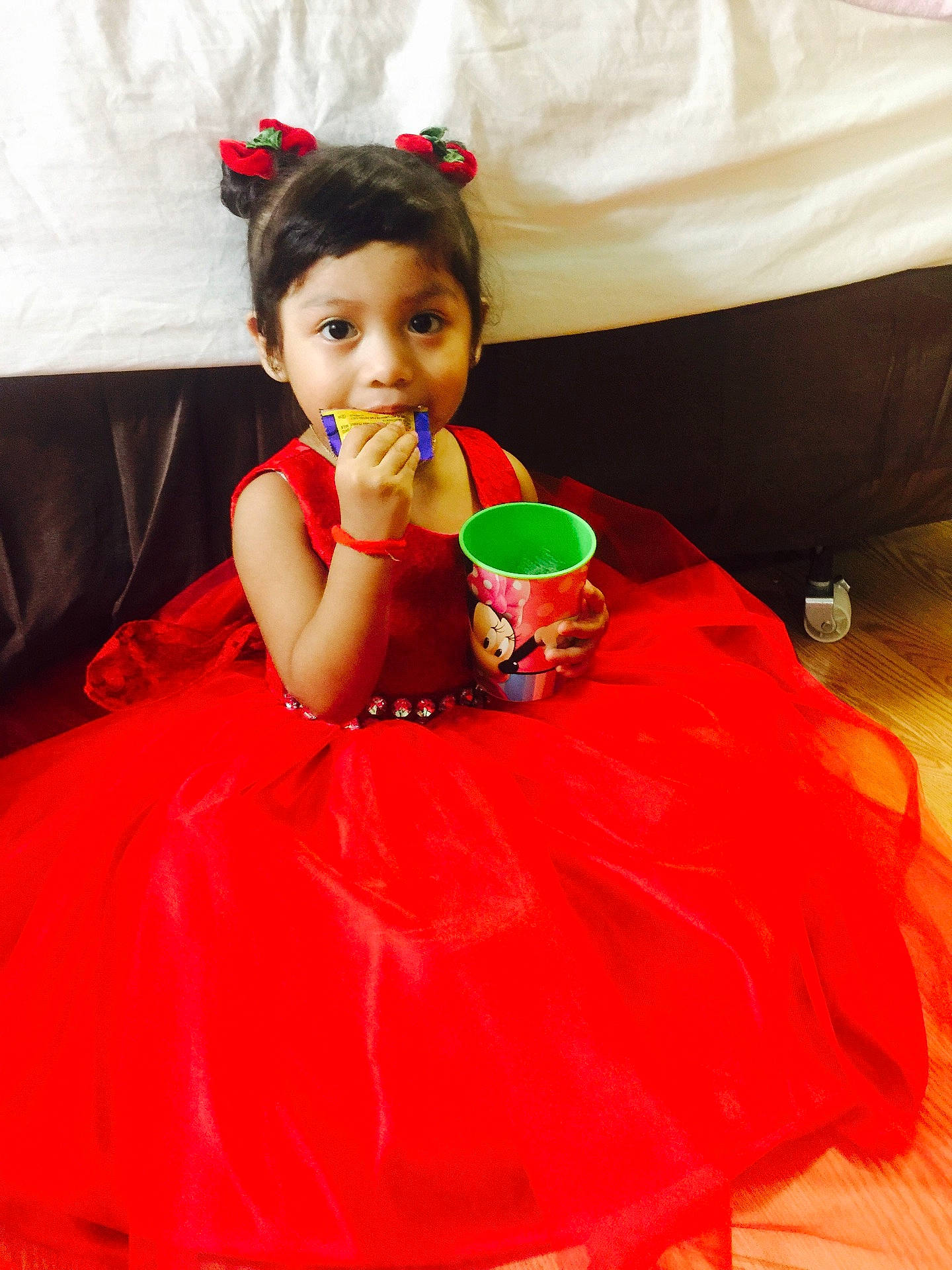 A. Kimberly joined the competition — help win amazing prizes! ballet_tutu, child, costume, dance_dress, dress, flower, fun, girl, gown, happiness, person, red, skin, smile, toddler