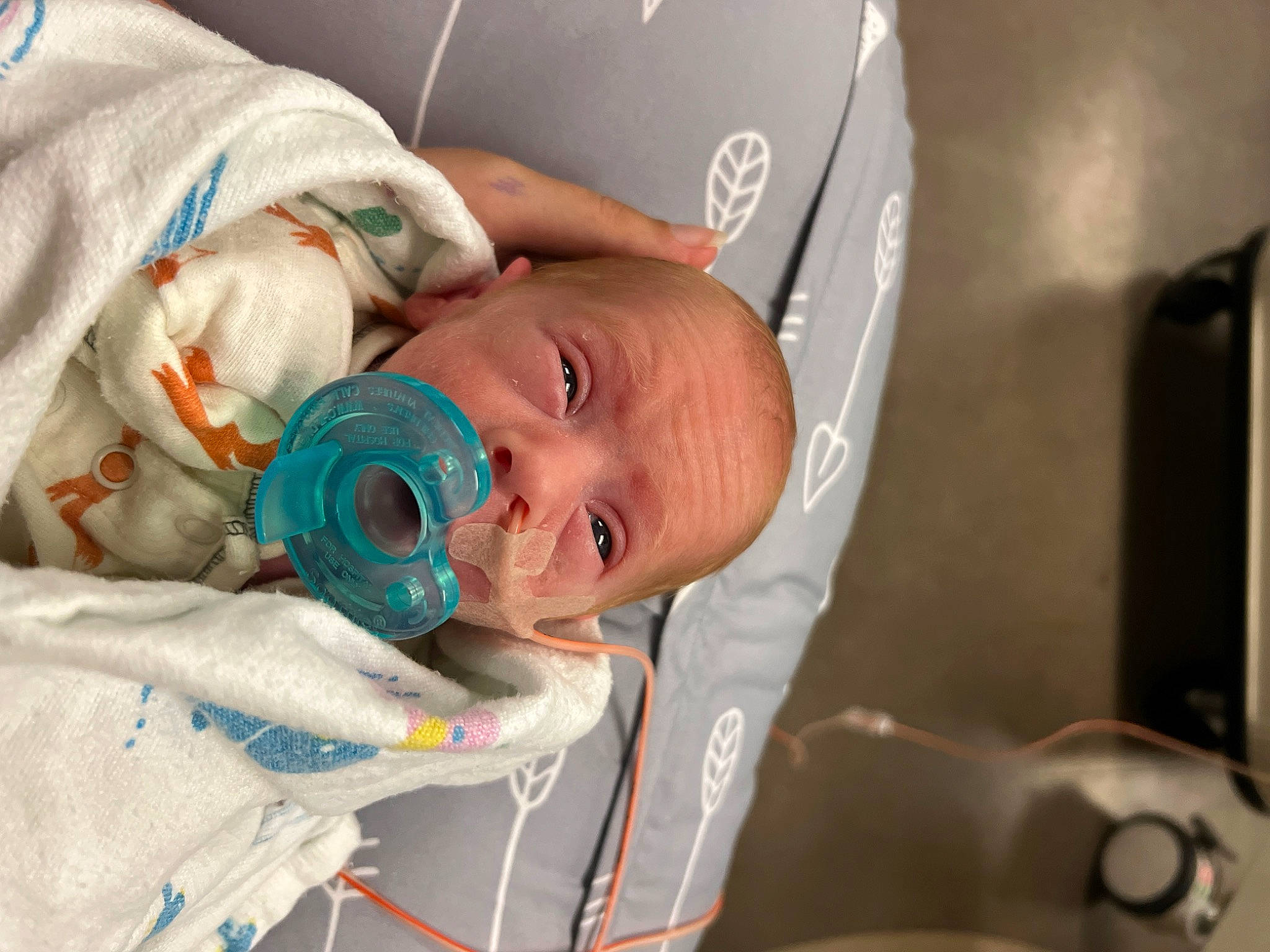 Sylas is registered to the contest to win money with this photo: baby, baby_products, child, comfort, event, eye, eyelash, hat, health_care, hospital, medical, medical_equipment, medical_procedure, mouth, person, room, service, skin, smile, stethoscope