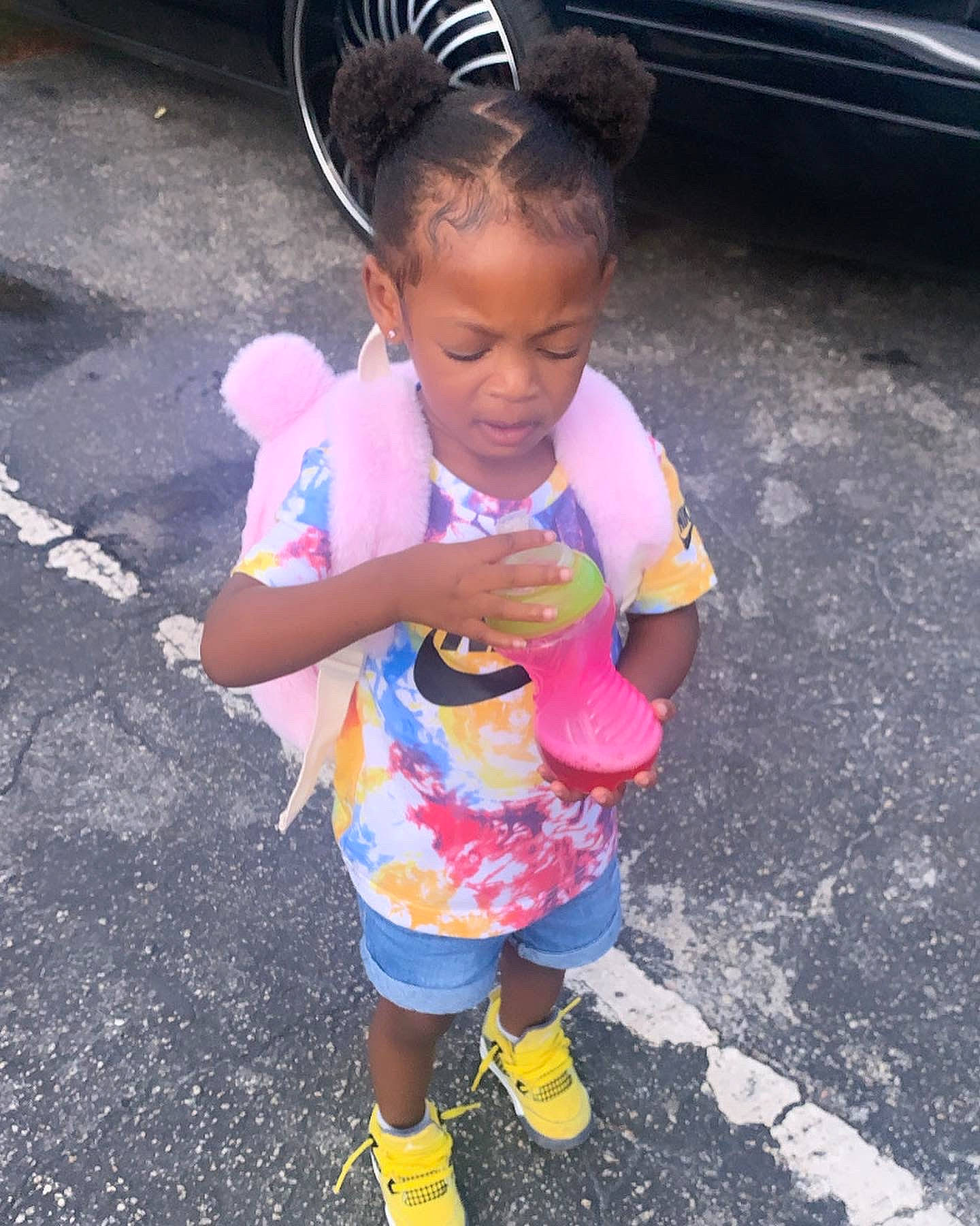 Teyana joined the competition — help win amazing prizes! asphalt, automotive_exterior, automotive_tire, child, cool, dress, face, happy, head, magenta, person, pink, recreation, road, road_surface, shoe, street, tire, toddler, vehicle_door