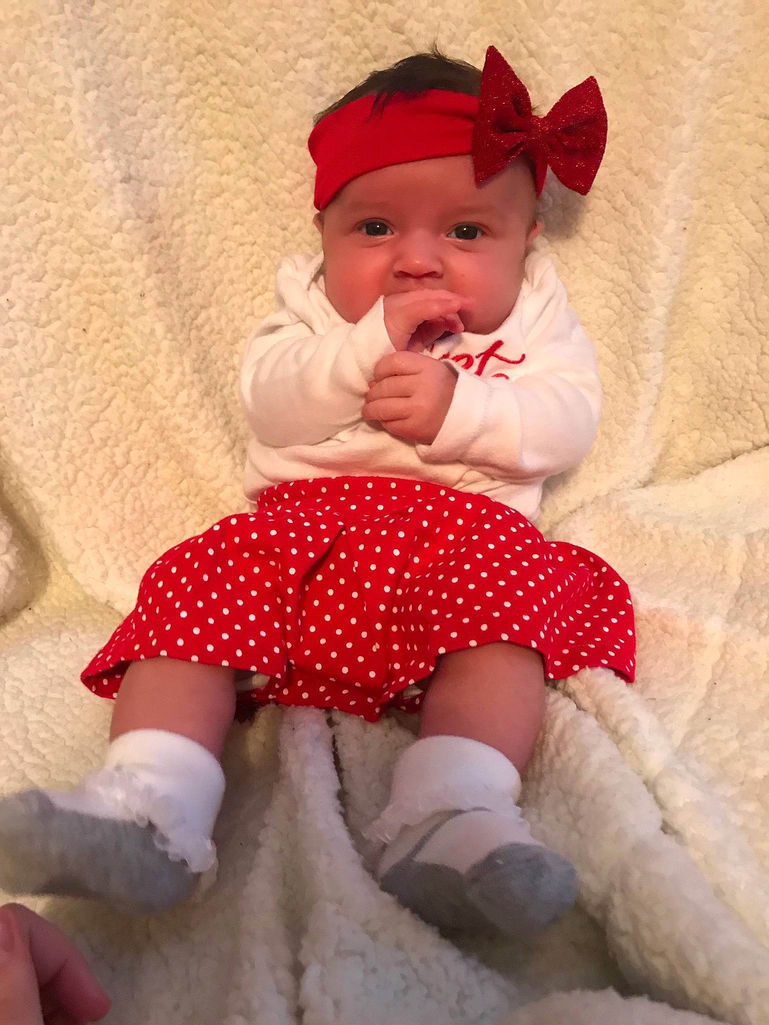 Rosie joined the competition — help win amazing prizes! baby, baby_toddler_clothing, cheek, child, design, lip, pattern, person, pink, polka_dot, red, skin, sleeve, smile, toddler