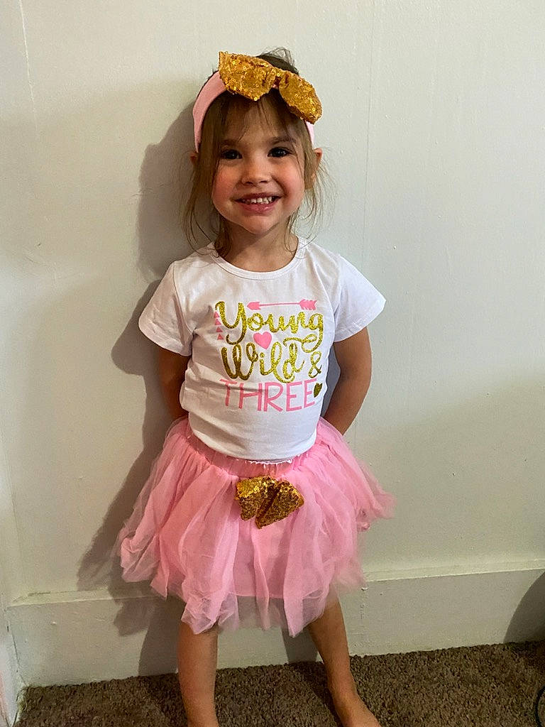 Lakota joined the competition — help win amazing prizes! arm, baby_toddler_clothing, child, clothing, face, facial_expression, fun, hair, happy, headpiece, joy, leg, magenta, organ, person, pink, skin, sleeve, smile, toddler