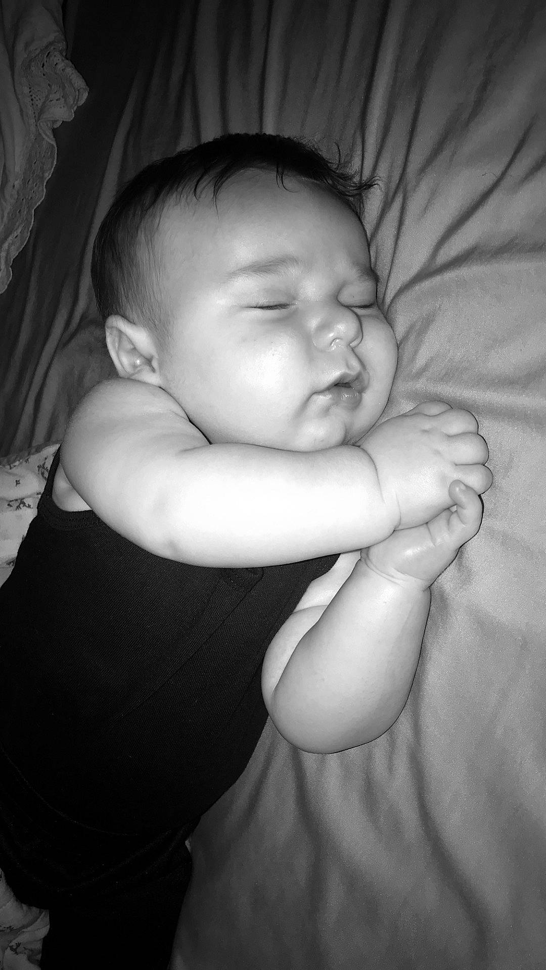 Kylan joined the competition — help win amazing prizes! arm, baby, black, black_and_white, cheek, child, eye, face, hand, head, lip, monochrome, monochrome_photography, mouth, nose, person, photograph, photography, skin, sleep