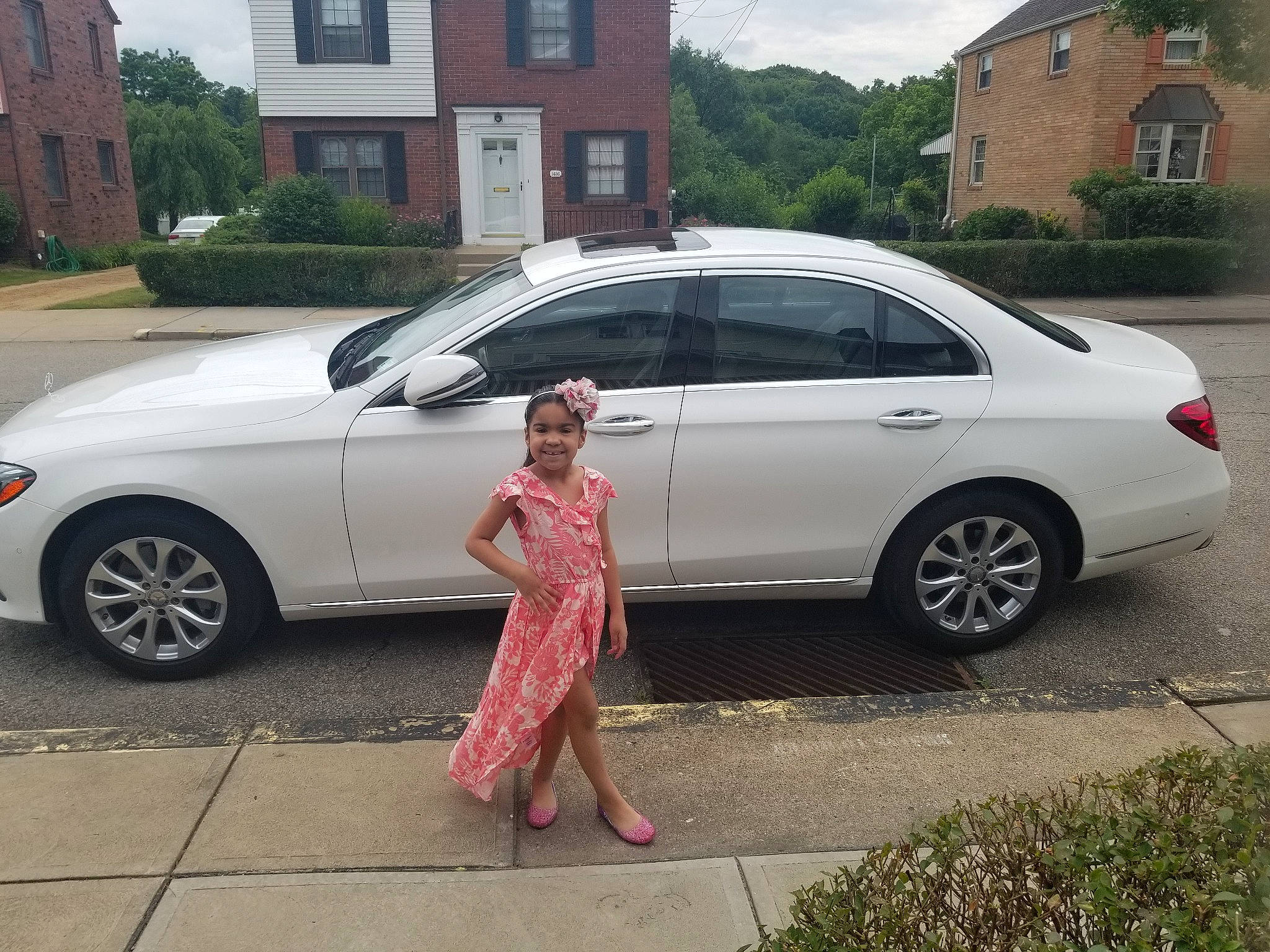 Aleena joined the competition — help win amazing prizes! alloy_wheel, automotive_design, automotive_exterior, automotive_lighting, automotive_tire, automotive_wheel_system, car, headwear, joy, land_vehicle, mode_of_transport, motor_vehicle, person, personal_luxury_car, plant, rim, sky, tire, vehicle, vehicle_door