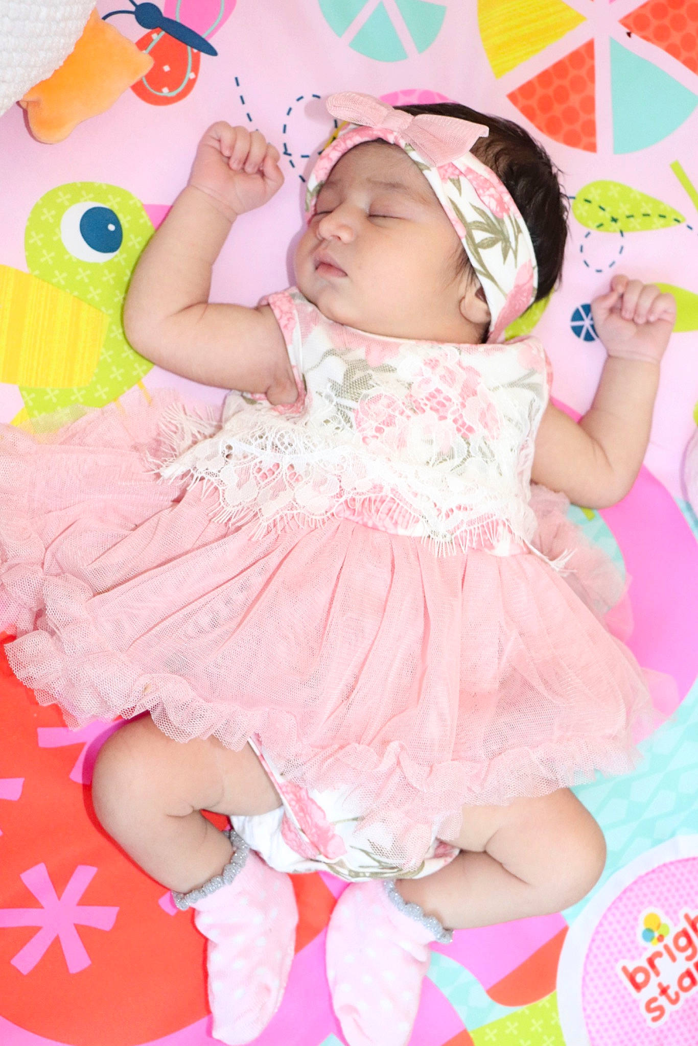 Haniya is registered to the contest to win money with this photo: baby, child, costume, headwear, peach, person, pink, toddler