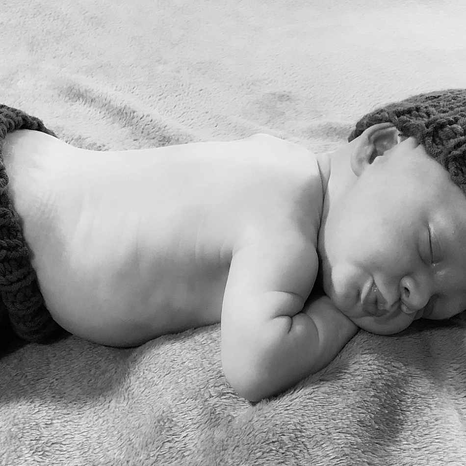 Warren joined the competition — help win amazing prizes! arm, art, baby, bedding, chest, comfort, fur, gesture, grey, hand, happy, head, human_leg, linens, mammal, monochrome, monochrome_photography, room, toddler, wood