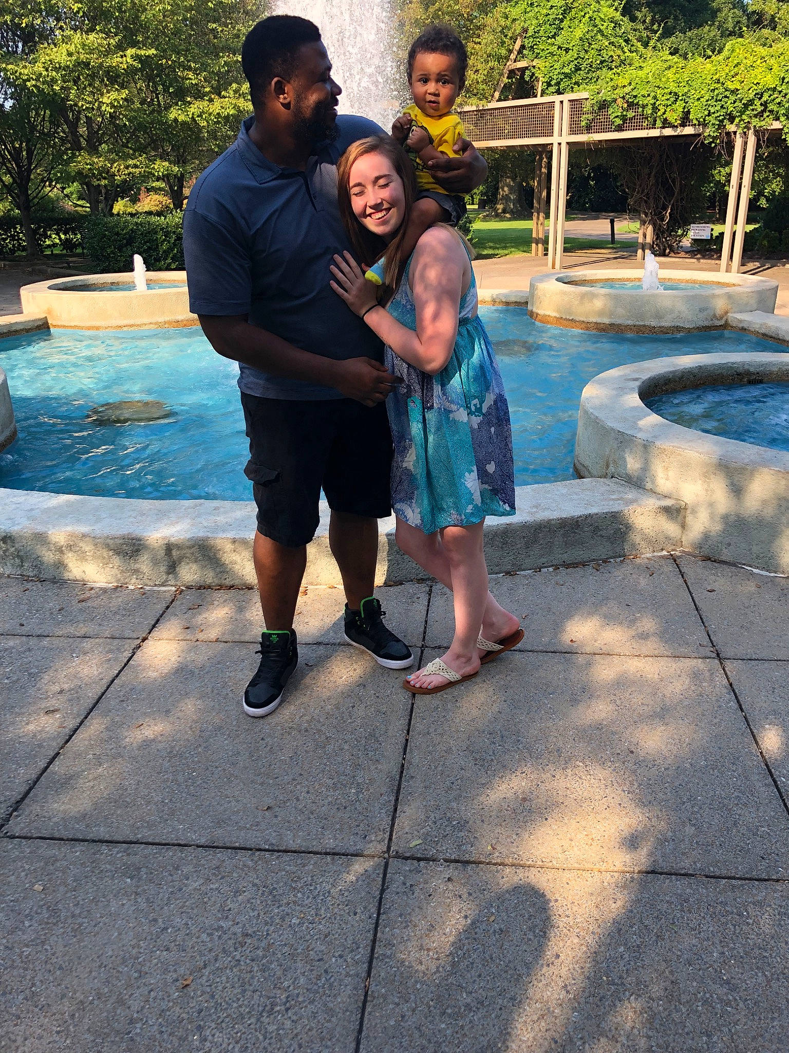 Aydrian is registered to the contest to win money with this photo: child, daughter, family, joy, leg, leisure, love, people, person, recreation, smile, summer, technology, toddler, tree, vacation