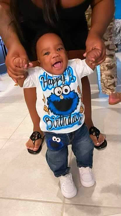 Markis joined the competition — help win amazing prizes! arm, baby, baby_toddler_clothing, electric_blue, finger, gesture, hand, happy, head, joint, person, shoe, shorts, shoulder, sleeve, smile, sneakers, sportswear, t_shirt, thumb