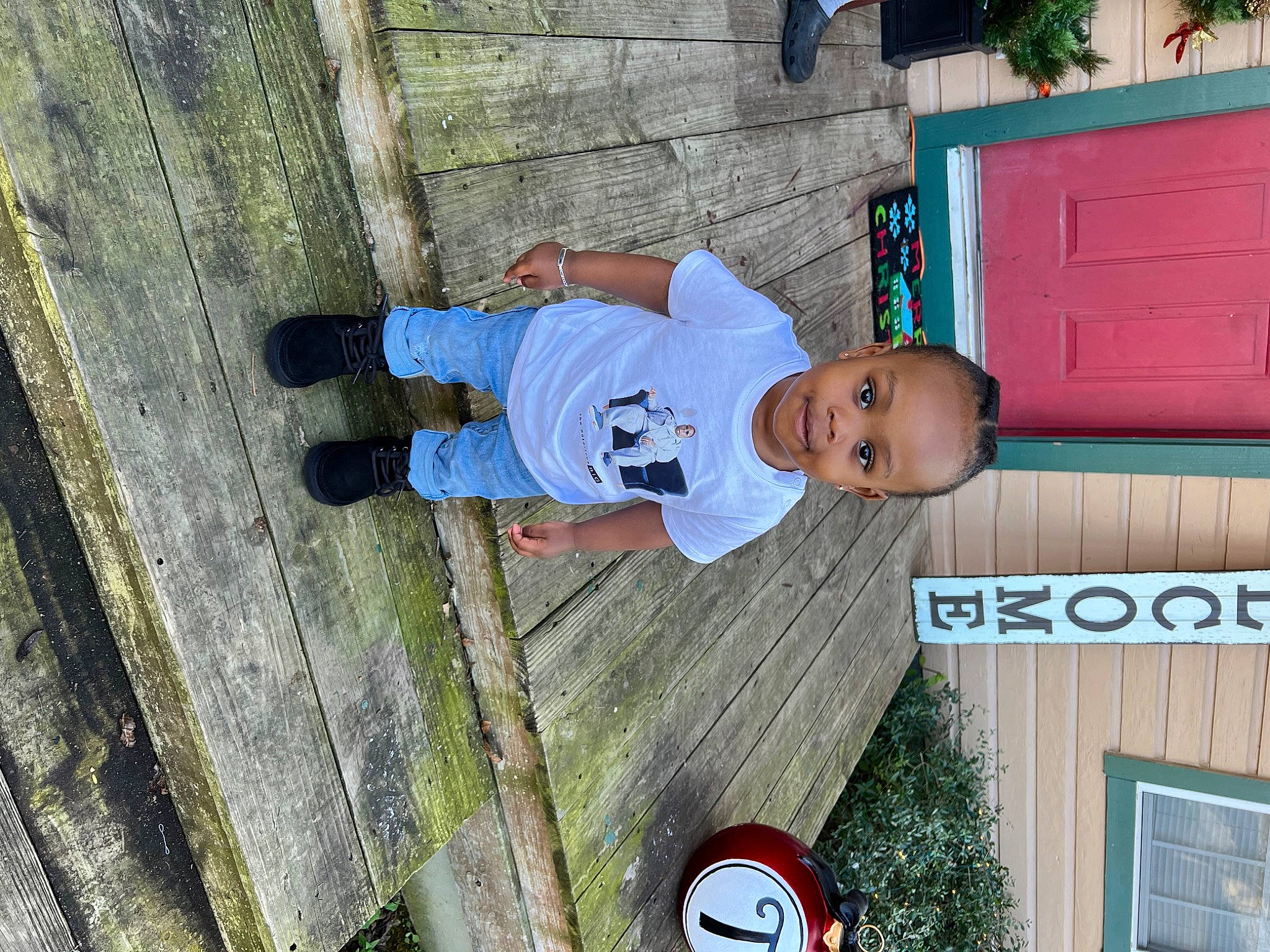 Kasen joined the competition — help win amazing prizes! baby, baby_toddler_clothing, cabinetry, child, fun, hat, leisure, logo, outdoor_shoe, person, plant, t_shirt, toddler, tree, walking_shoe, wood, world