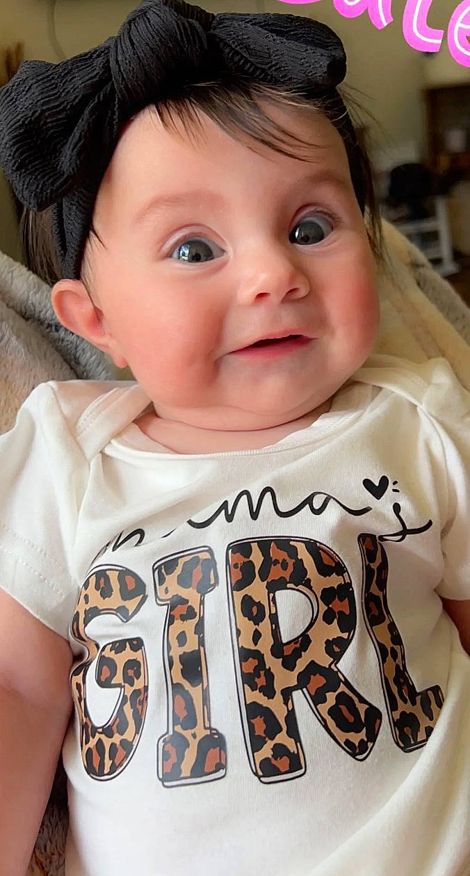 Cyrah is registered to the contest to win money with this photo: baby, baby_toddler_clothing, cheek, child, chin, cool, eyebrow, eyelash, facial_expression, hairstyle, happy, iris, neck, nose, pattern, person, skin, sleeve, smile, t_shirt