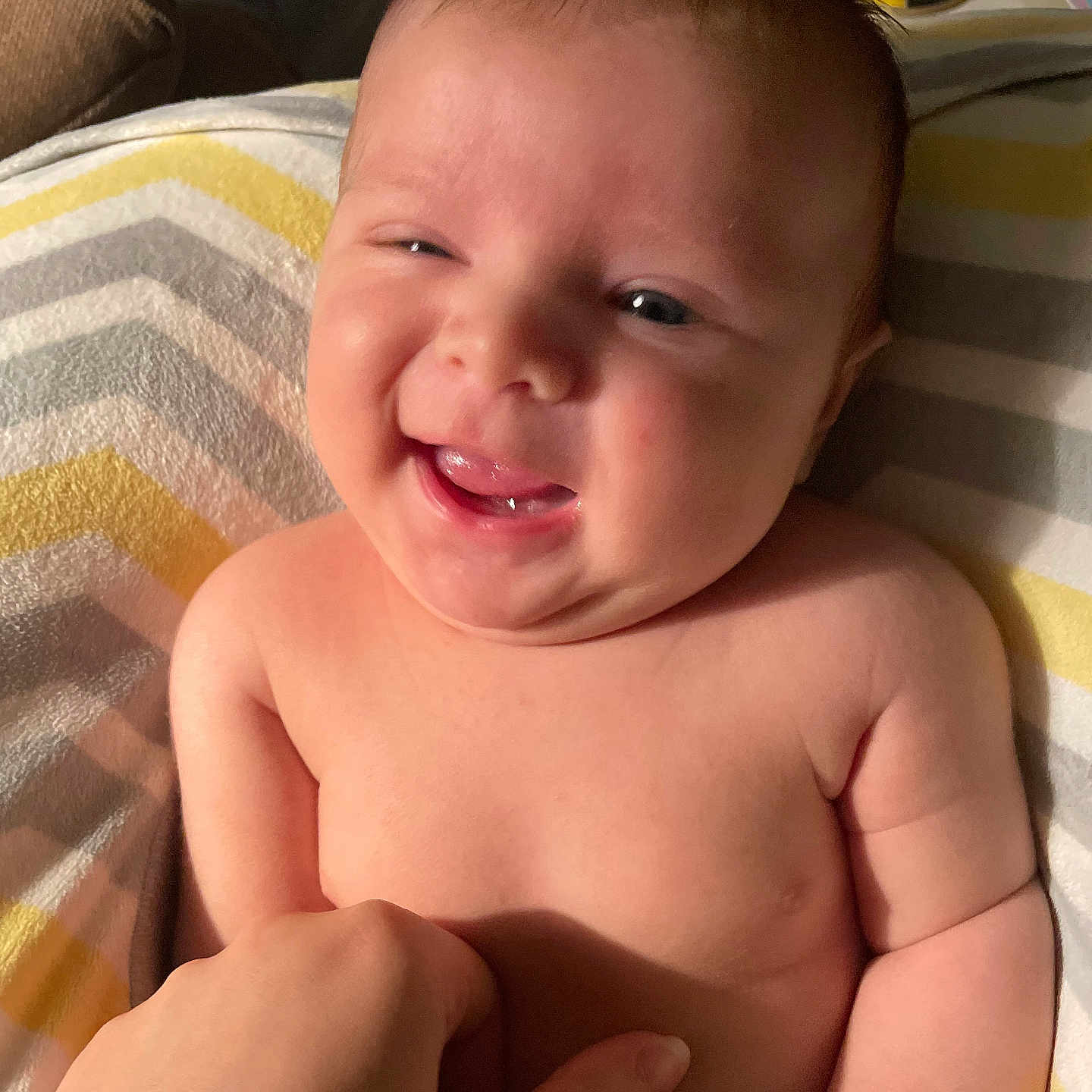 Anthony is registered to the contest to win money with this photo: baby, babylaughing, bodypart, cushion, face, finger, furniture, hand, happy, head, homedecor, laughing, mouth, newborn, person, photography, portrait, smile, teeth, towel