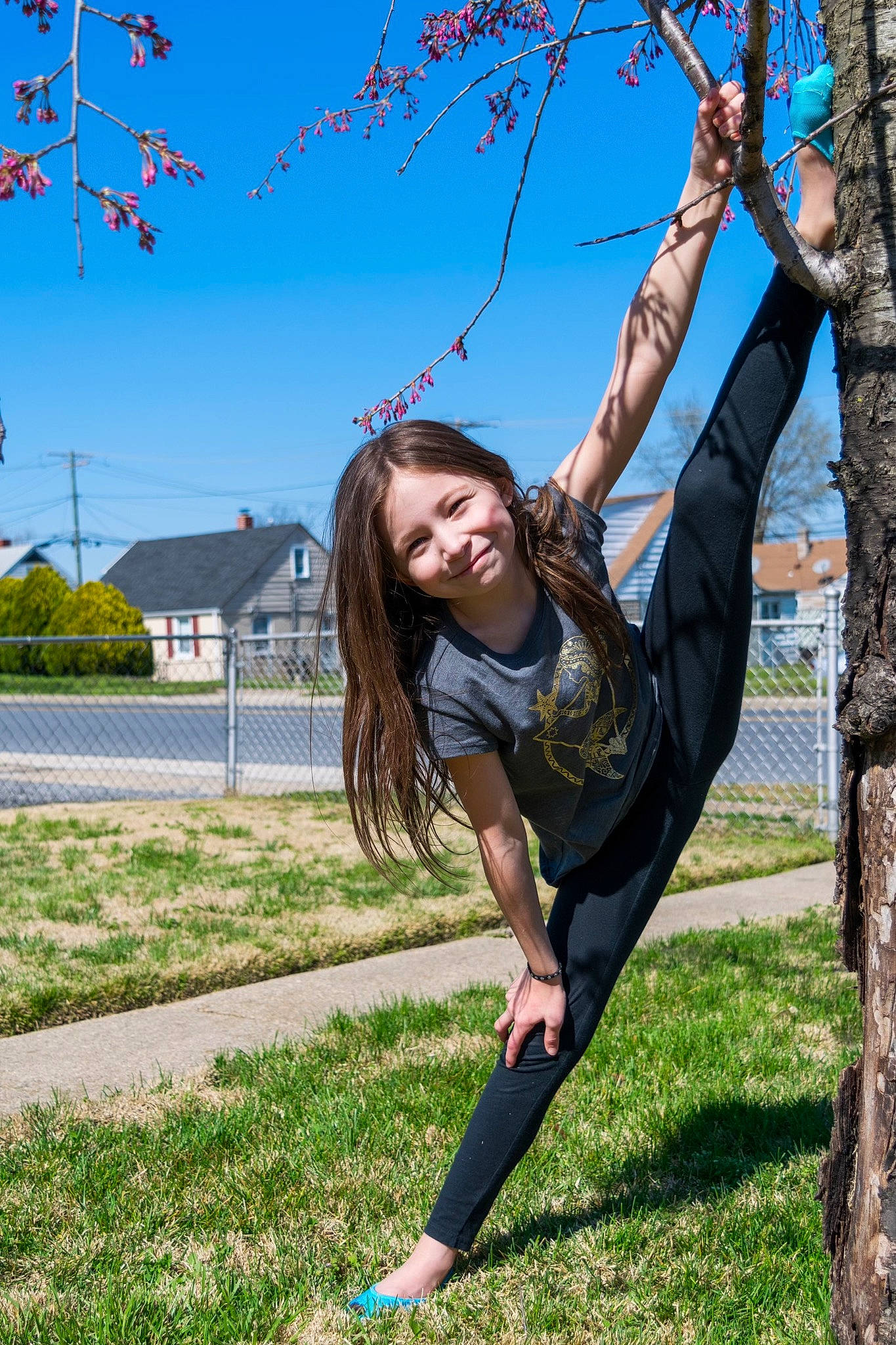 Isabelle joined the competition — help win amazing prizes! blossom, branch, electric_blue, fun, grass, happy, joy, knee, leisure, people_in_nature, person, plant, recreation, sky, smile, spring, t_shirt, tree, trunk, twig