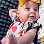 Haylen is registered to the contest to win money with this photo: animal_print, arm, baby, baby_girl, blanket, child, clothing, cute, eyes, fabric, face, hand, headband, indoor, infant, pattern, portrait, skin, smile, yellow_bow