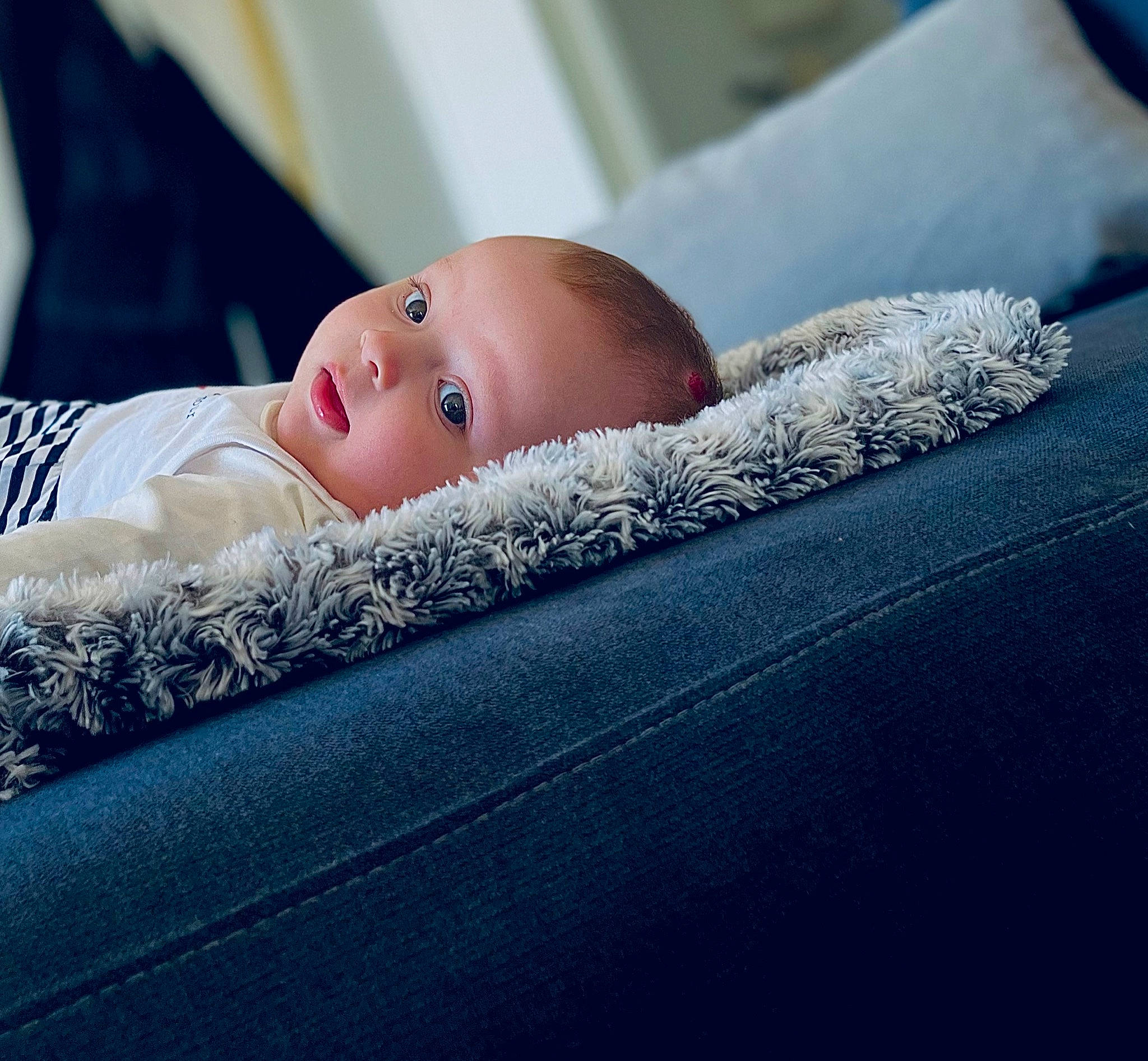 Nïa participe au concours pour gagner de l'argent avec cette photo : arm, baby, baby_sleeping, baby_toddler_clothing, bedding, blue, comfort, electric_blue, eye, eyelash, flash_photography, hand, hat, headgear, human_body, iris, linens, lip, person, toddler