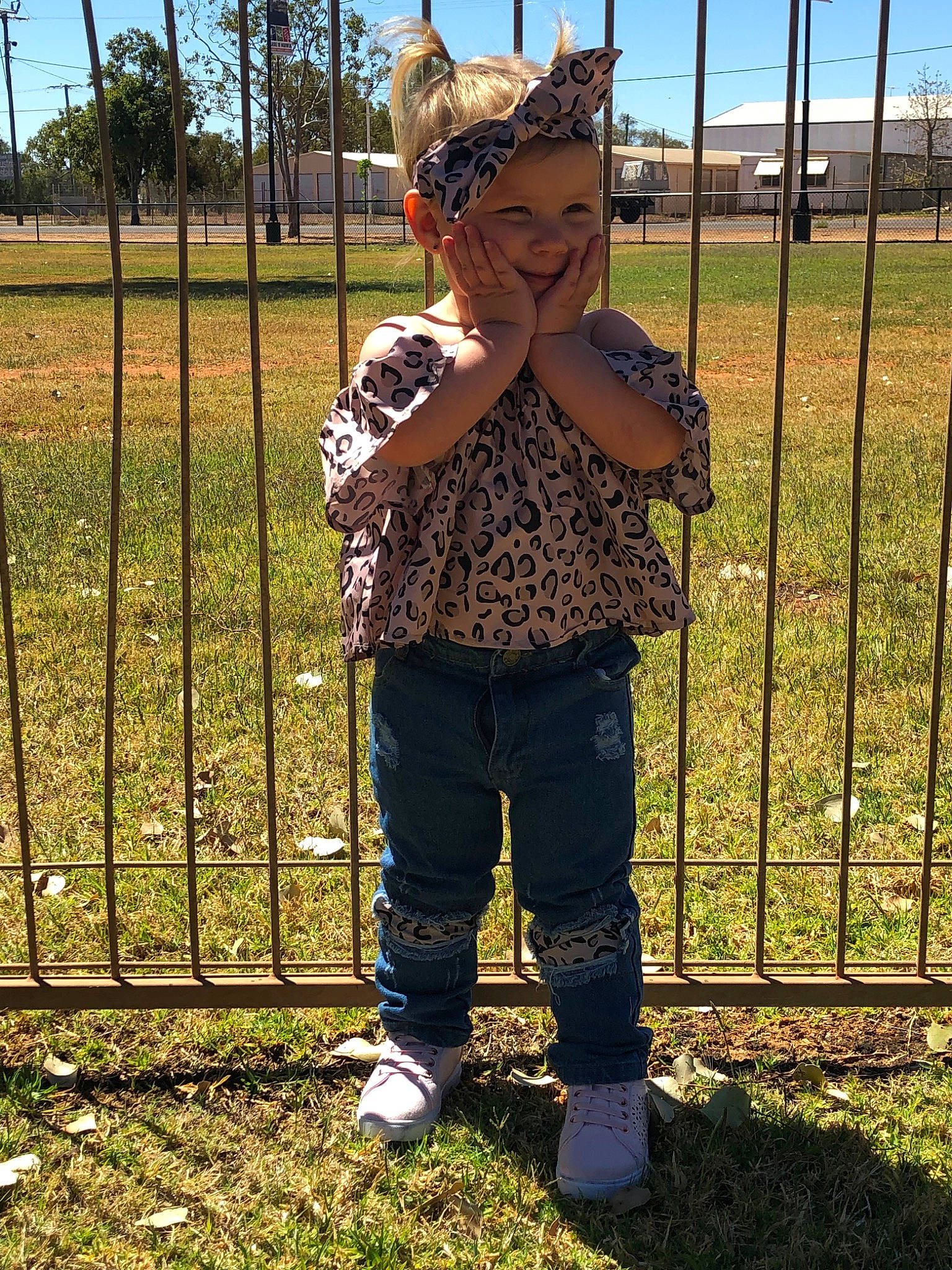 Indiana joined the competition — help win amazing prizes! child, fawn, fun, grass, headwear, jeans, outerwear, person, plant, smile, tree