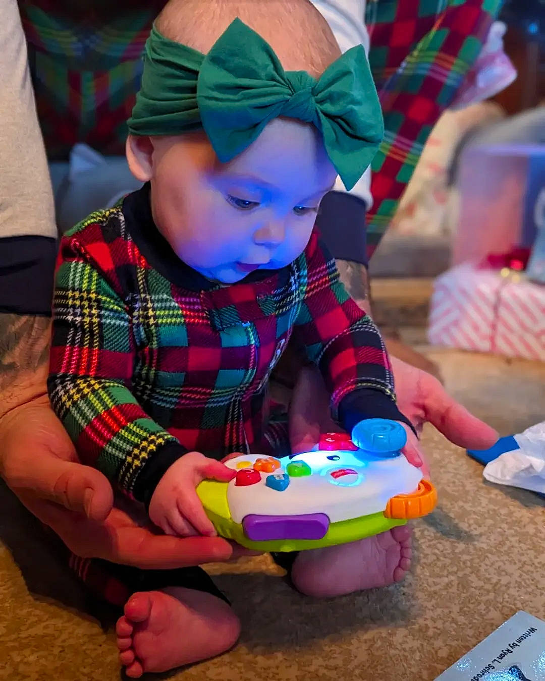 Francesca joined the competition — help win amazing prizes! baby, baby_playing_with_toys, baby_toddler_clothing, blue, child, design, event, fun, green, hat, holiday, pattern, person, plaid, play, purple, recreation, sitting, tartan, toddler
