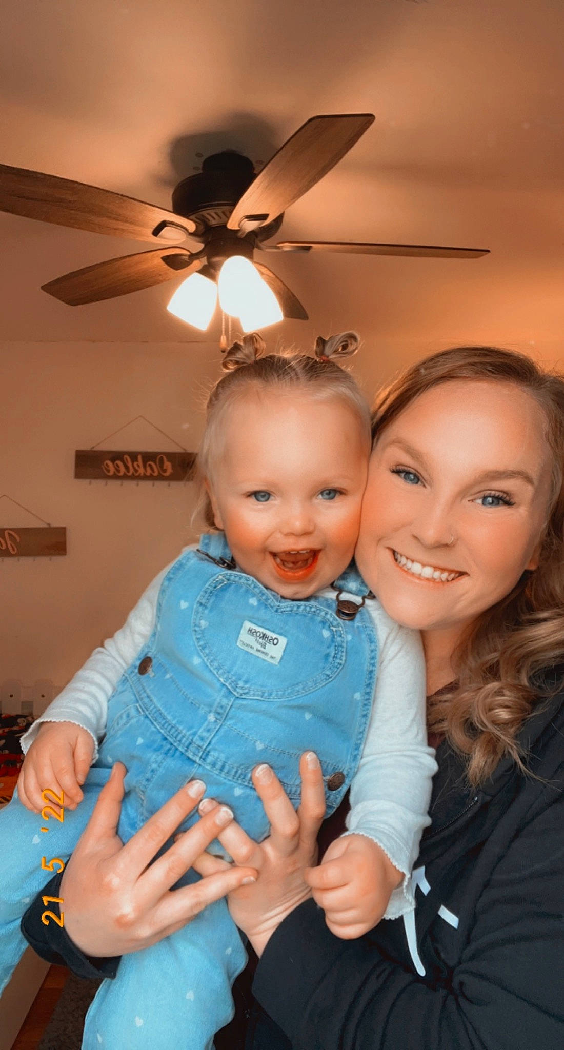 Oaklee is registered to the contest to win money with this photo: baby, baby_toddler_clothing, ceiling, ceiling_fan, child, event, fashion_accessory, flash_photography, fun, gesture, hairstyle, hand, happy, home_appliance, iris, jewellery, joy, mechanical_fan, person, skin