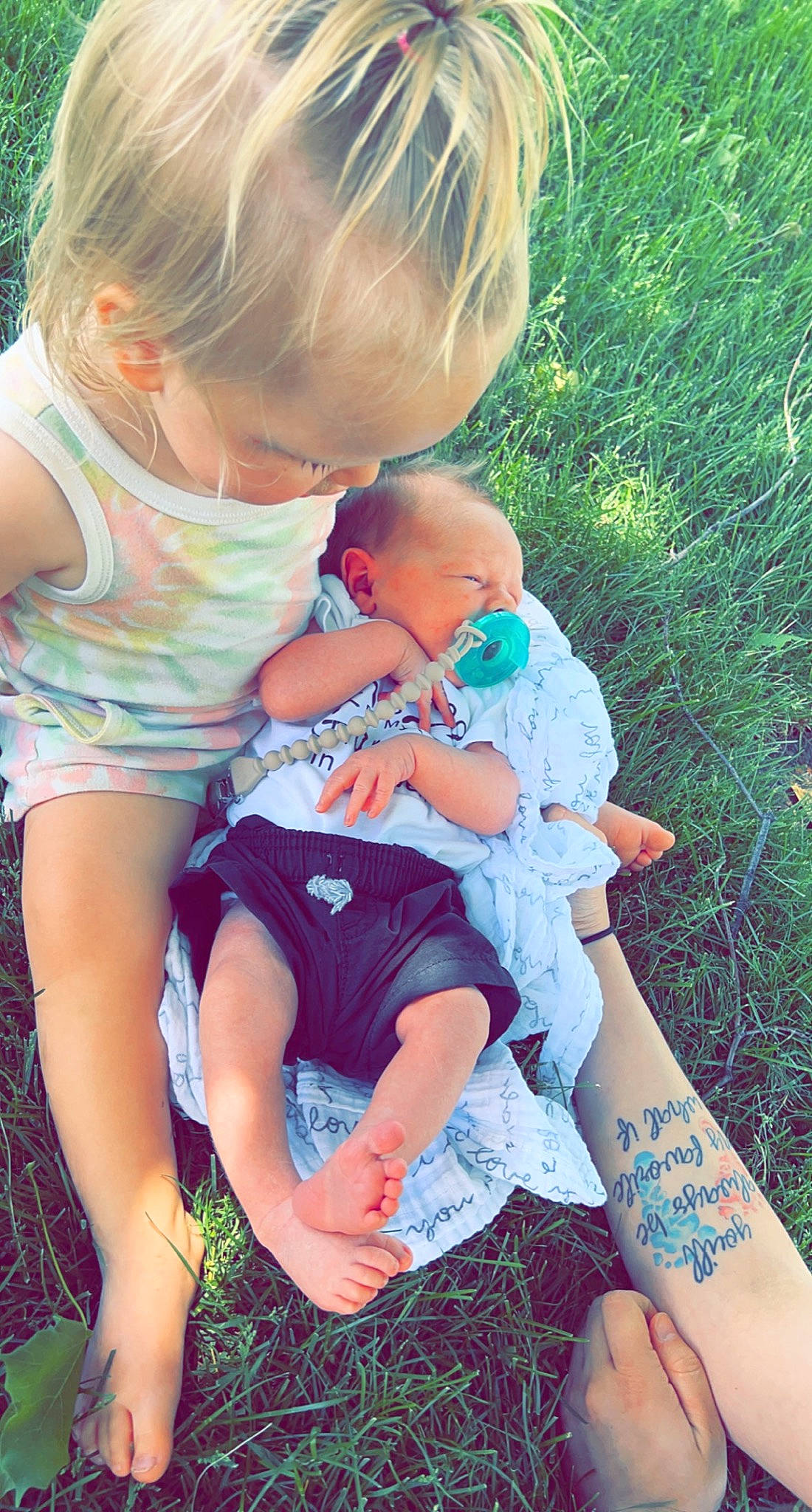 Oaklee joined the competition — help win amazing prizes! baby, baby_toddler_clothing, cool, finger, fun, grass, happy, head, interaction, leaf, leisure, people_in_nature, person, pink, plant, skin, summer, sunglasses, thigh, toddler