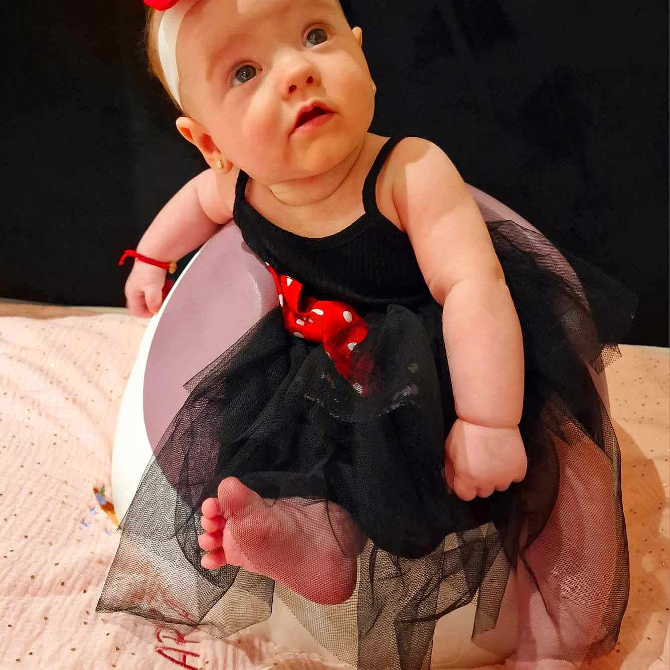 Ariana is registered to the contest to win money with this photo: accessories, baby, barefoot, bathing, bathroom, bathtub, bed, bedroom, bodypart, bowtie, bracelet, chair, clothing, costume, couch, crawling, cushion, doll, dress, earring