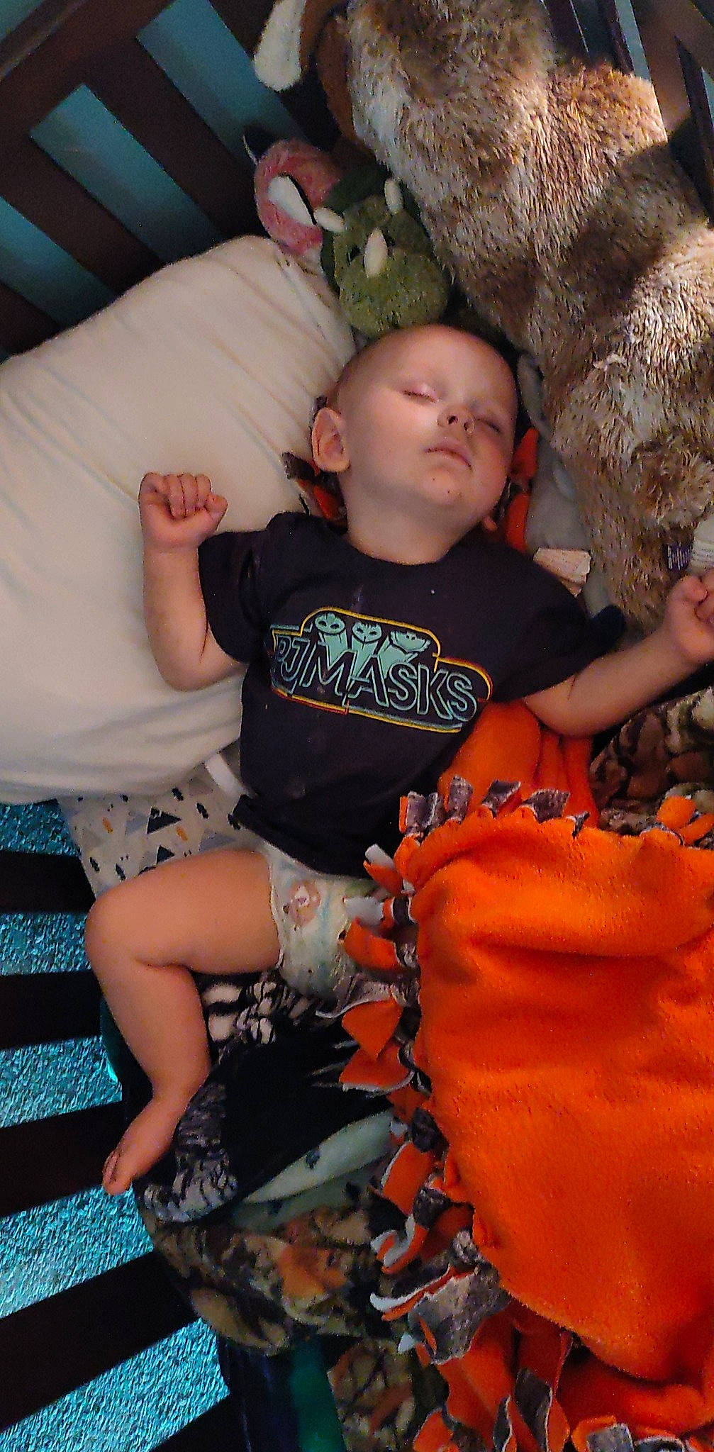 Wesley joined the competition — help win amazing prizes! baby, baby_toddler_clothing, calabaza, child, comfort, couch, fun, glove, grass, happy, human_leg, lap, orange, person, shorts, sitting, sock, t_shirt, textile, thigh