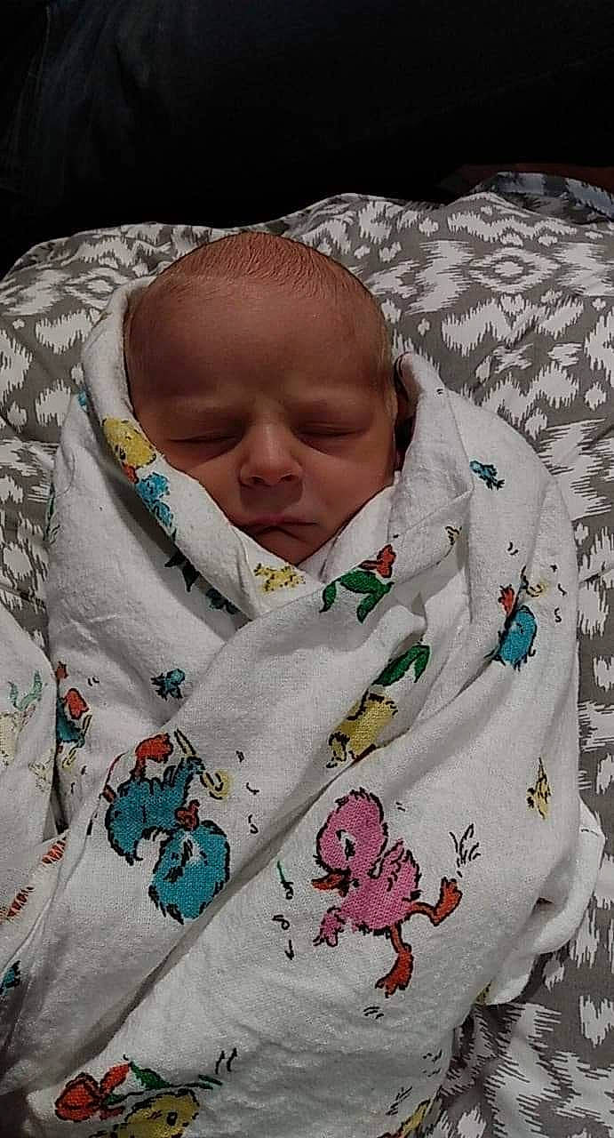 Wesley joined the competition — help win amazing prizes! baby, baby_products, baby_sleeping, baby_toddler_clothing, bedding, bedtime, cheek, child, comfort, event, linens, mammal, outerwear, pattern, person, pink, room, skin, sleeve, textile