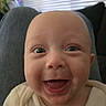 Blake joined the competition — help win amazing prizes! baby, smile, face, head, eyes, infant, clothing, indoor, person, happy, closeup, expression, skin, human, joy, sitting, window, blinds, plant, lap