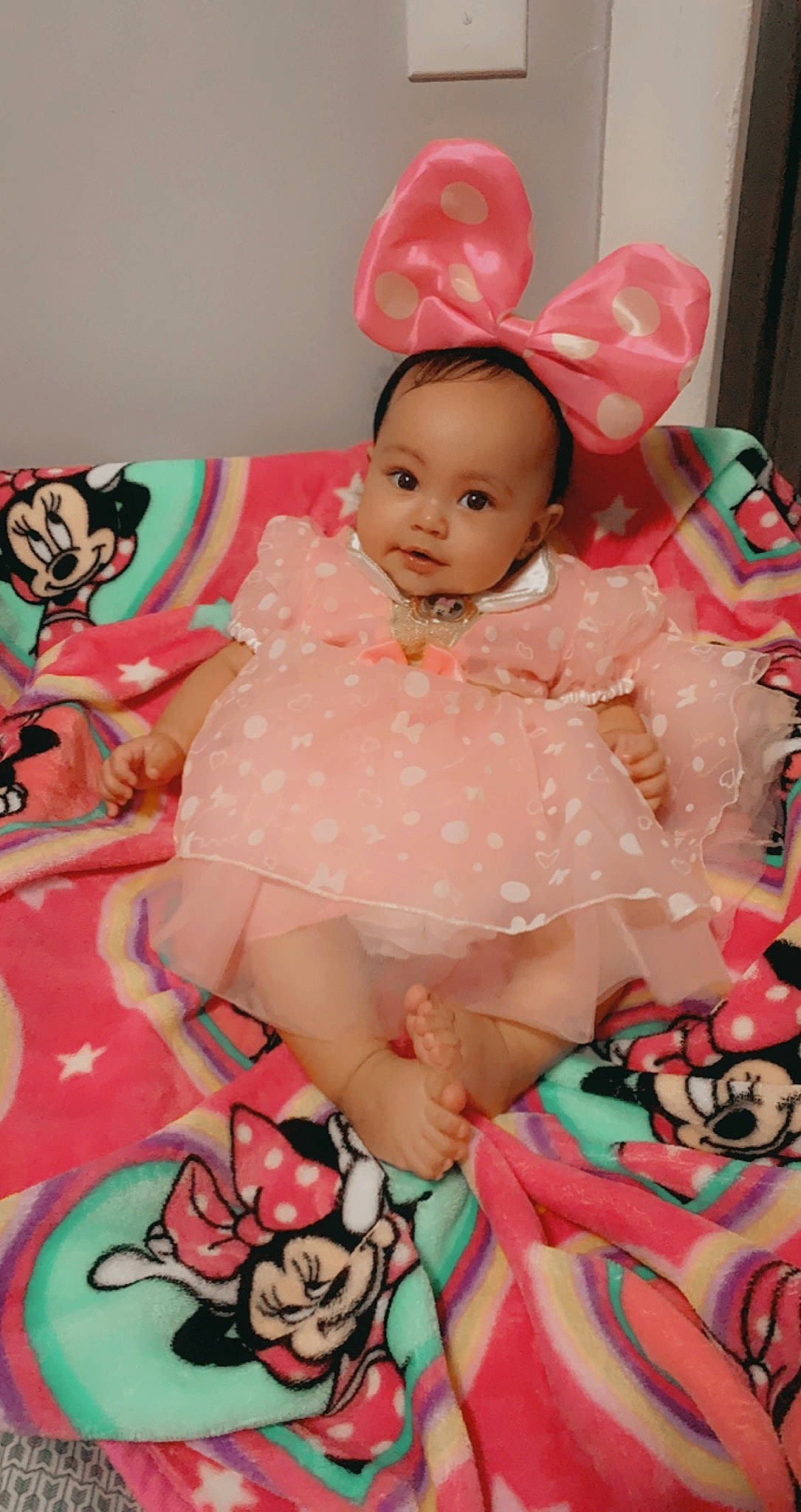 Sophia is registered to the contest to win money with this photo: baby, baby_toddler_clothing, child, costume, hair_accessory, peach, person, pink, textile, toddler