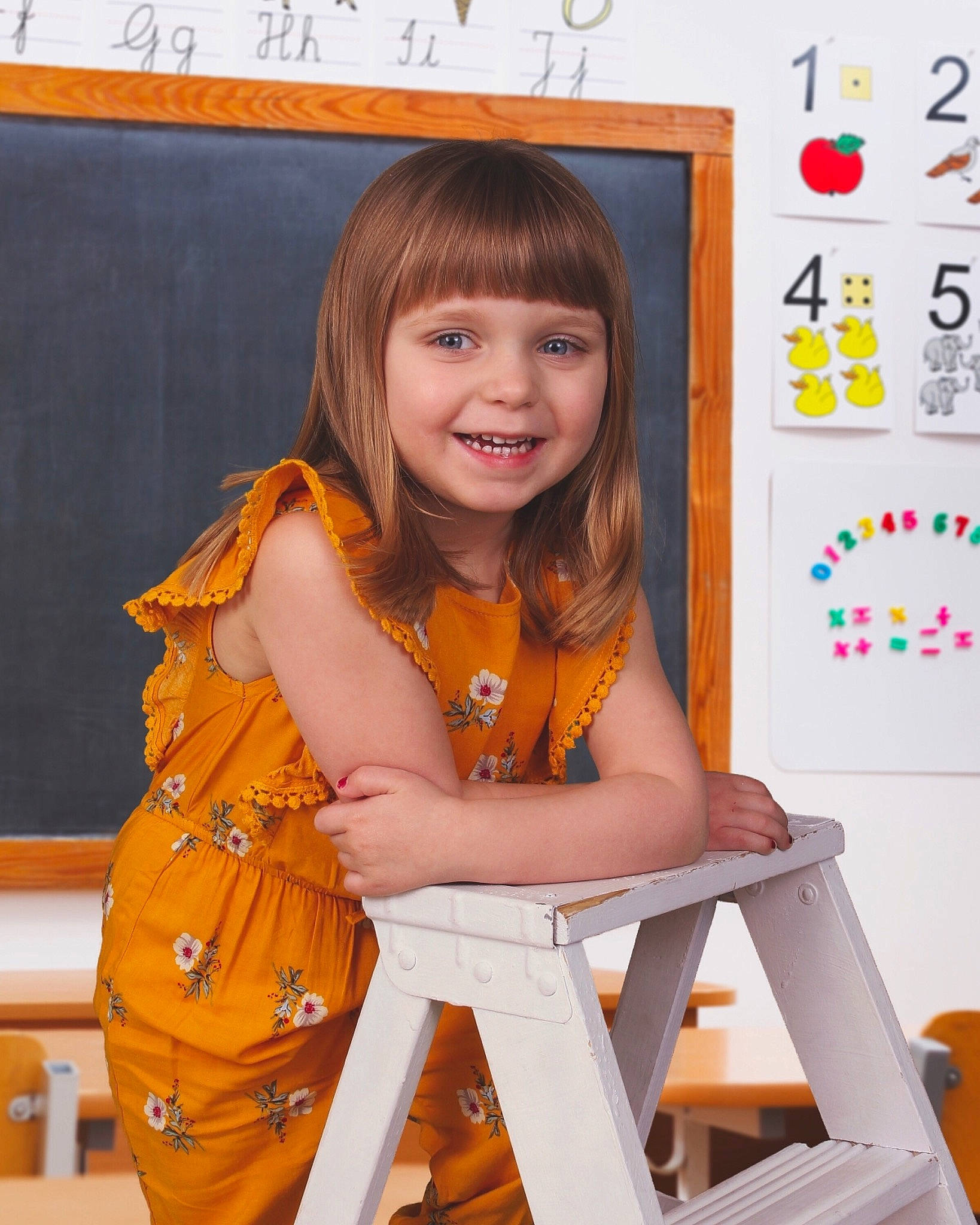 Audriana is registered to the contest to win money with this photo: child, child_model, joy, person, room, sitting, smile