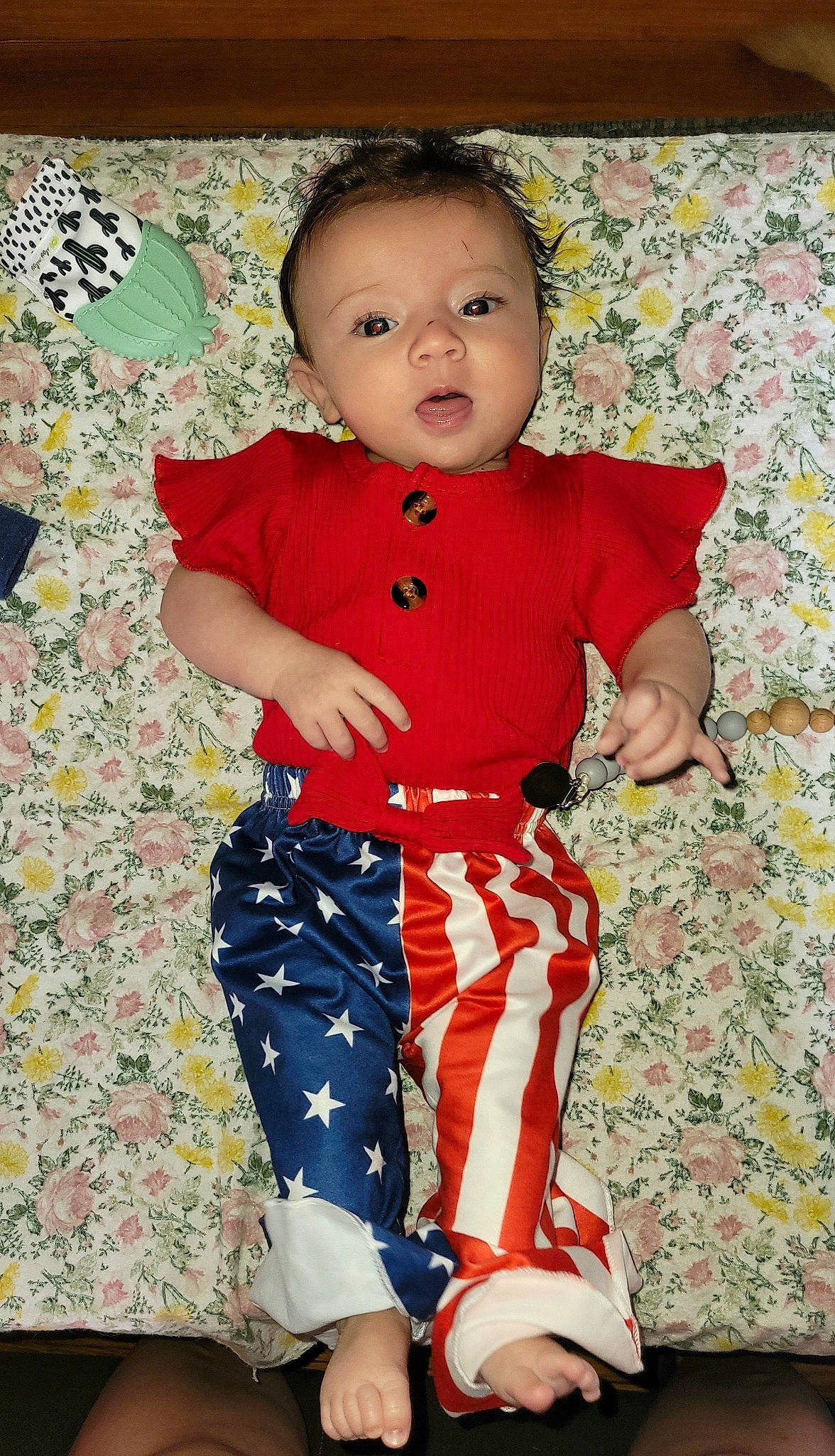 Kynsleigh is registered to the contest to win money with this photo: baby, baby_toddler_clothing, barefoot, child, eye, fun, happy, human_body, human_leg, linens, pattern, person, sitting, sleeve, t_shirt, textile, thigh, toddler, waist, wood