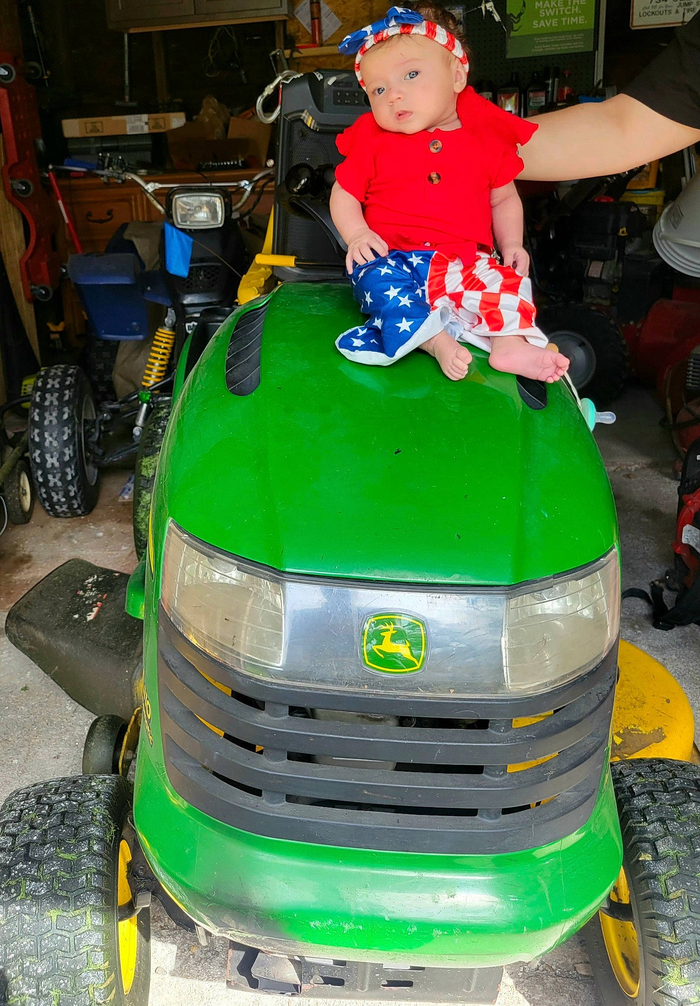 Kynsleigh joined the competition — help win amazing prizes! auto_part, automotive_design, automotive_exterior, automotive_lighting, automotive_tire, automotive_wheel_system, bumper, car, fun, green, grille, headlamp, headwear, hood, motor_vehicle, person, snapshot, tire, toddler, vehicle