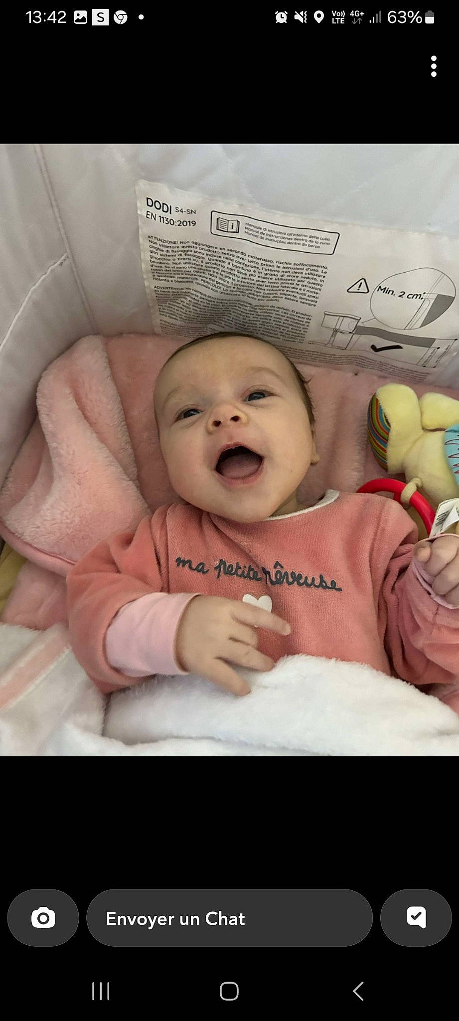 Nawelle participe au concours pour gagner de l'argent avec cette photo : baby, baby_products, baby_toddler_clothing, cheek, child, comfort, eyebrow, finger, font, gesture, happy, headwear, laugh, linens, mouth, nose, person, room, skin, sleeve