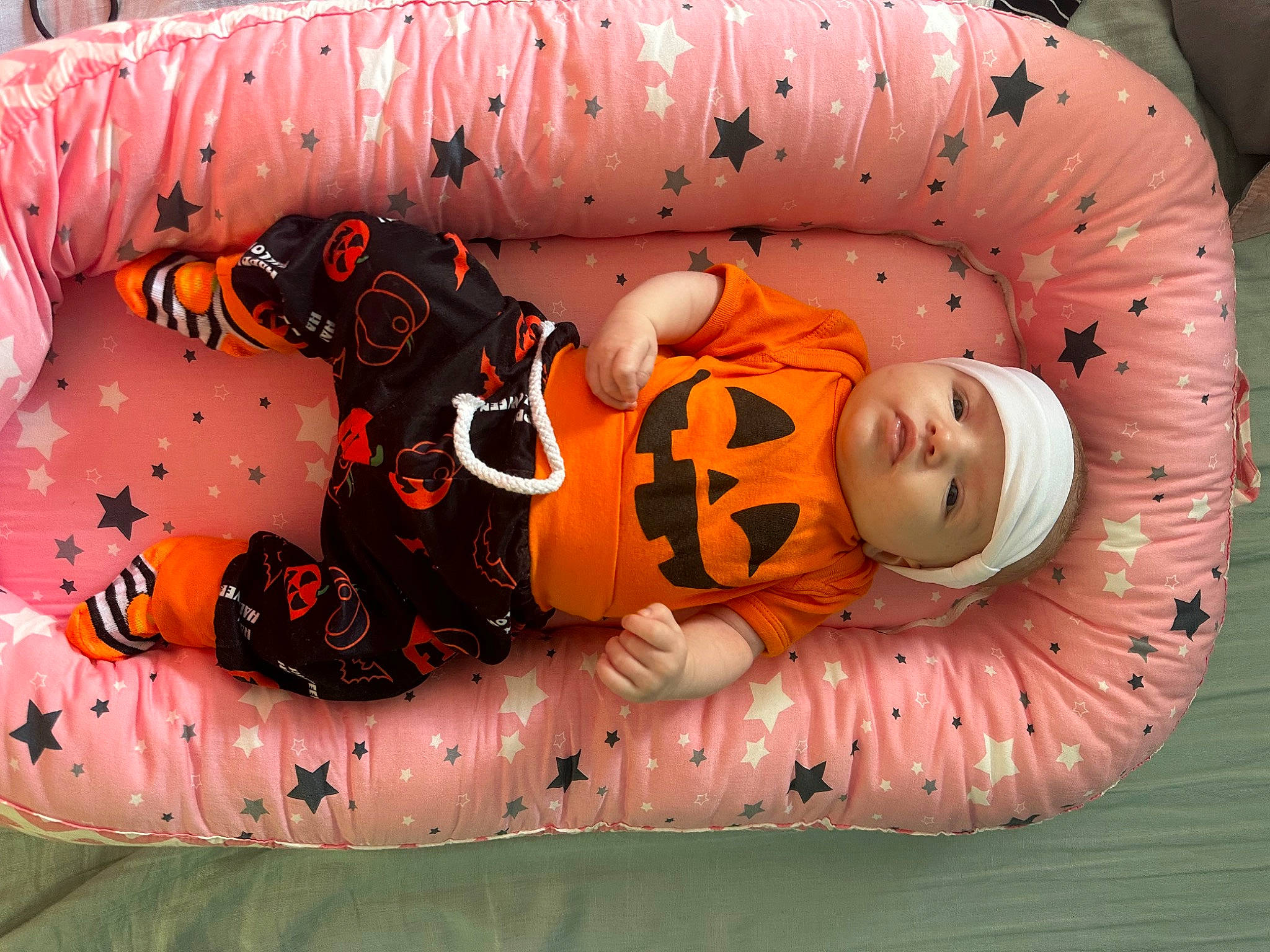 Isabella joined the competition — help win amazing prizes! baby, baby_products, baby_toddler_clothing, child, comfort, event, eye, fun, happy, head, headwear, human_body, inflatable, orange, pattern, person, plant, recreation, room, toddler